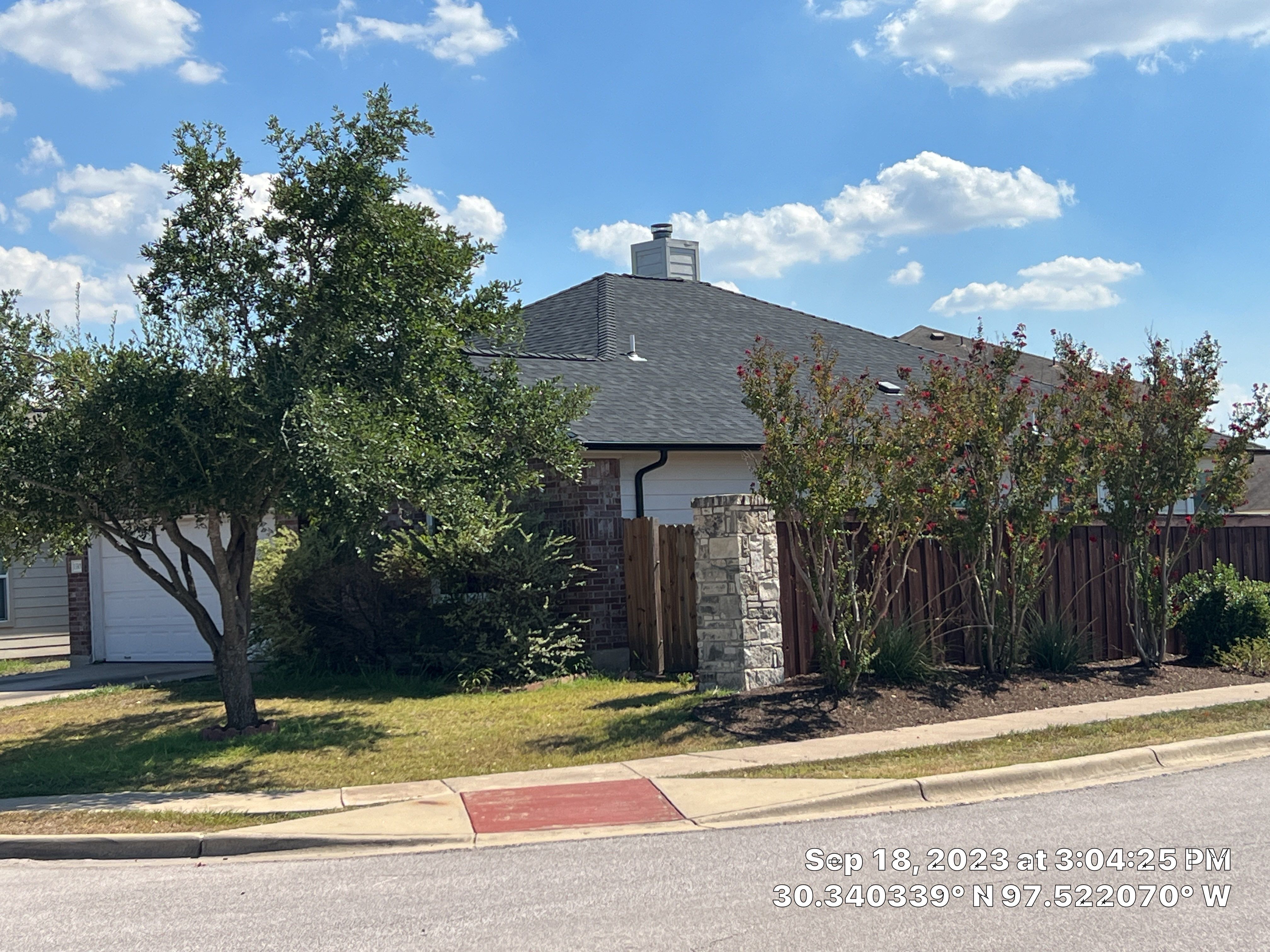 Asphalt Shingle Roof Replacement and Wind Damage Restoration in Manor by Caliber Restoration LLC