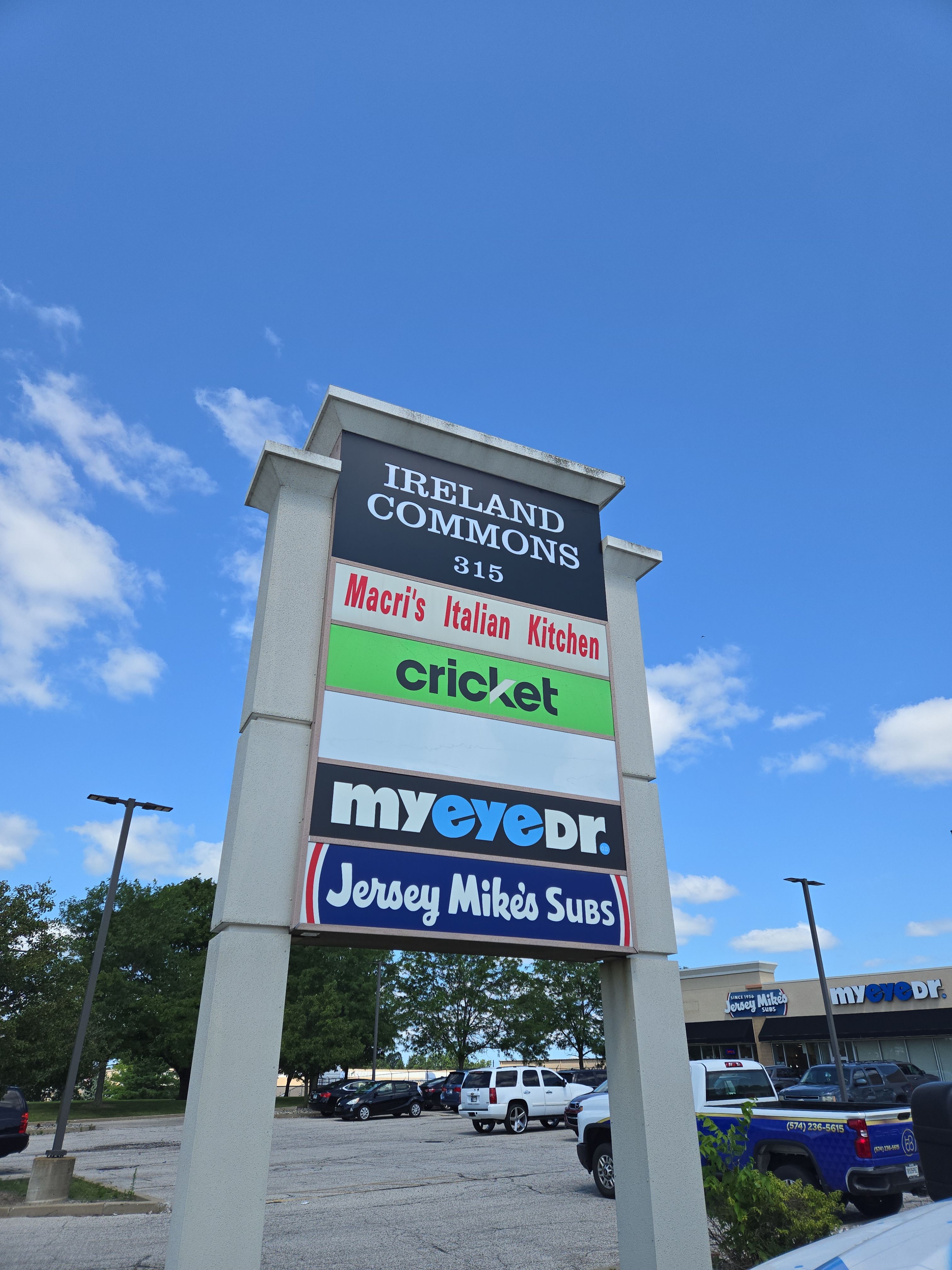Monument Sign Maintenance and Storefront Graphic Updates for Ireland Commons by Hayes Design co