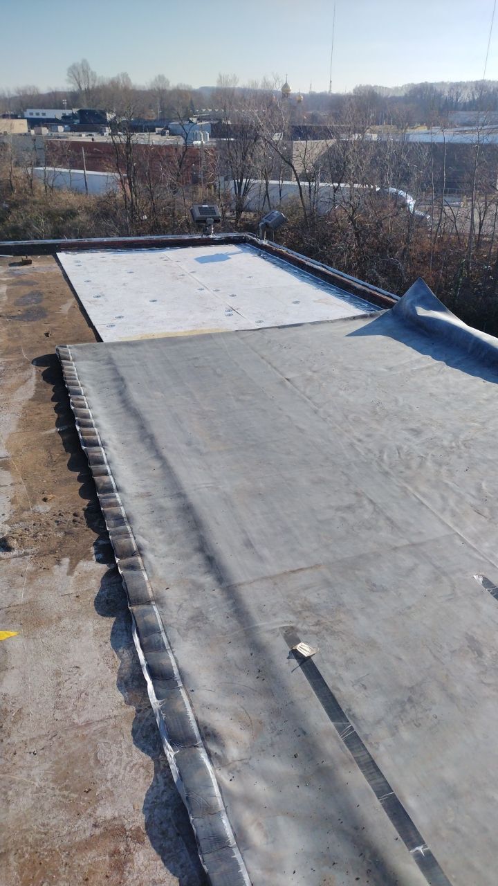 Commercial flat roof parma by Absolute Roofing and Construction