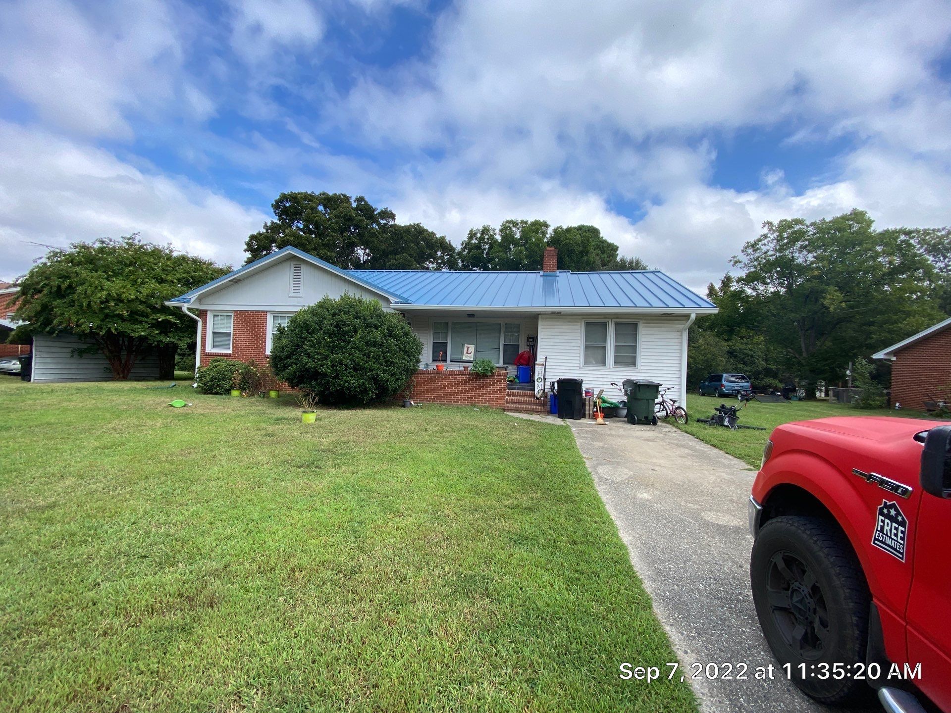 Carolina Blue Standing Seam Roof by Just In Time Roofing and Restoration