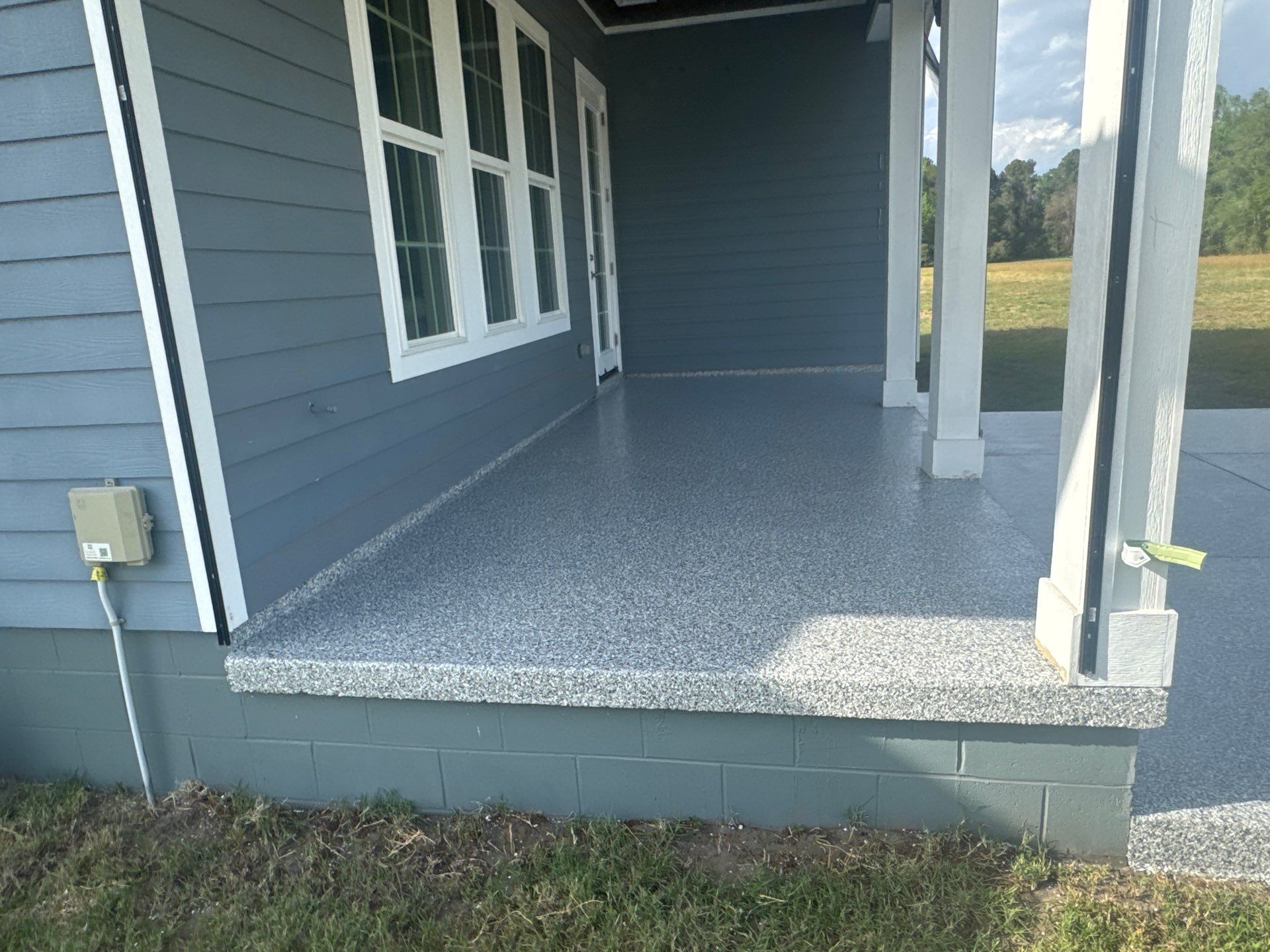 Back Patio in Slate Stone by Cross Creek Concrete Coatings