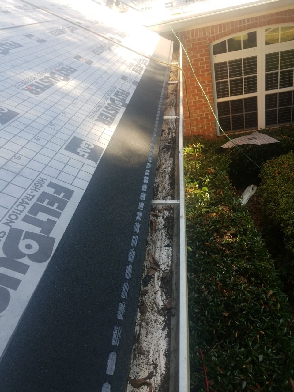 Residential Roofing Installation using Roof Replacement by American Roofing & Construction LLC