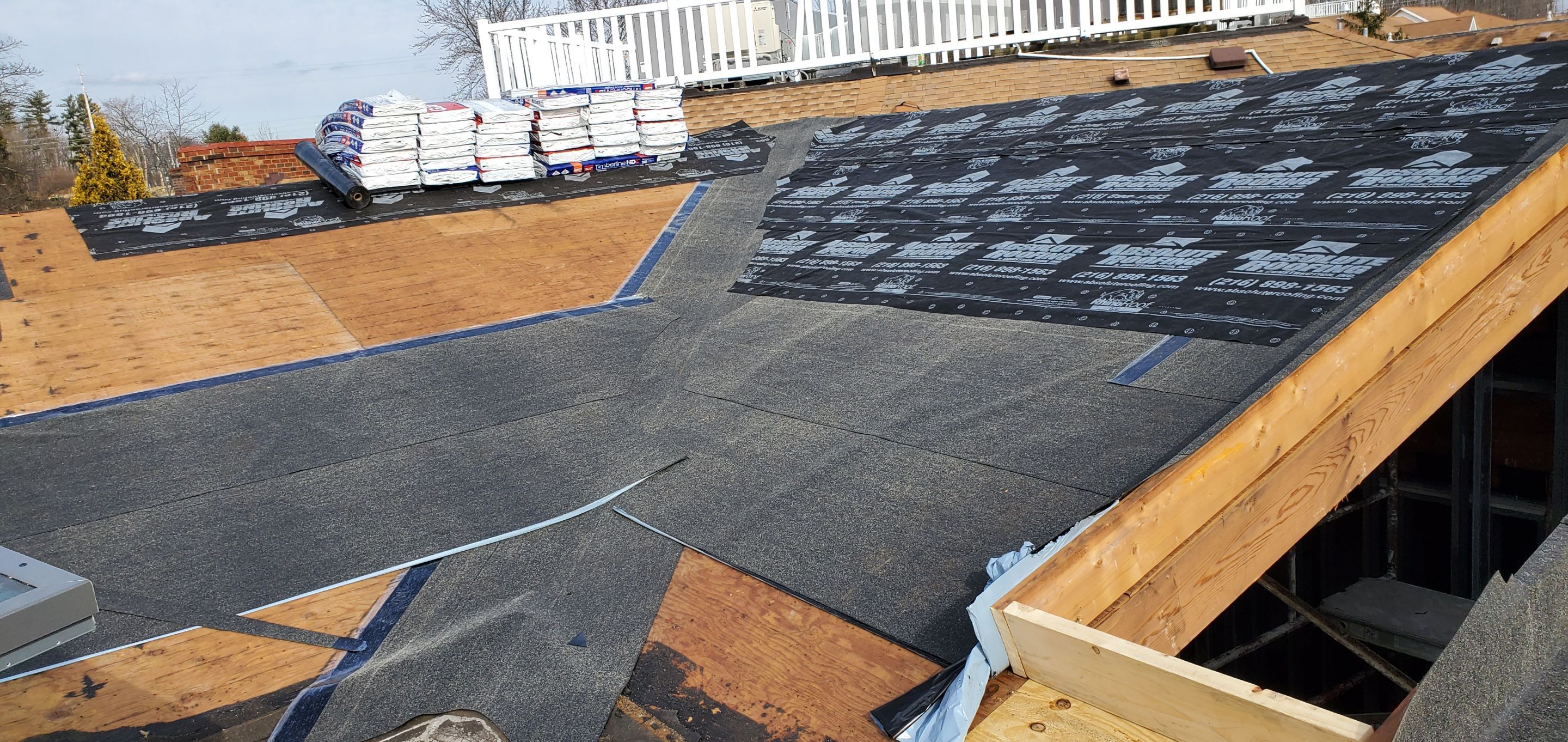 Skylight removal and install  by Absolute Roofing and Construction