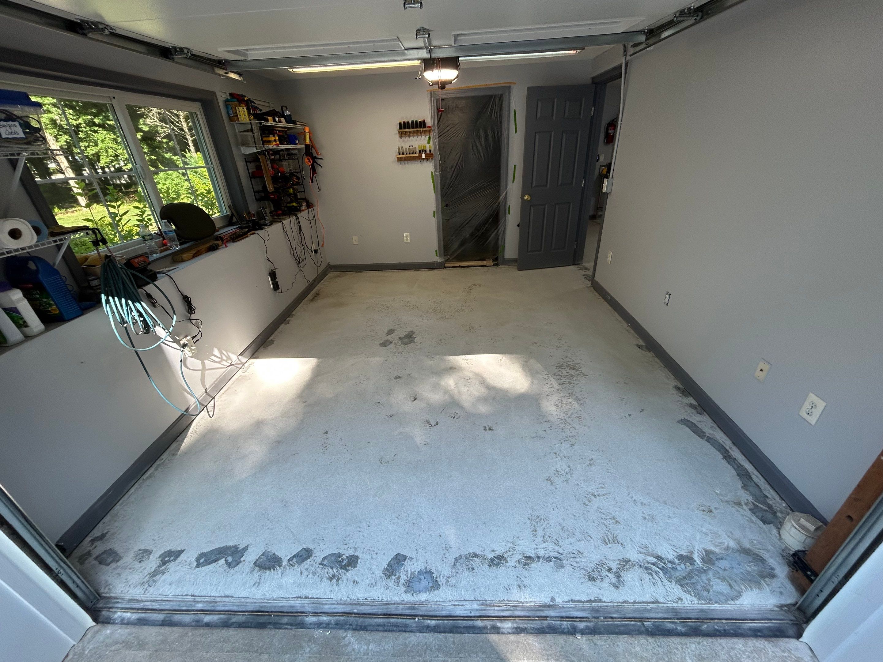Concrete Floor Coating Transformation by DiGiorgi Roofing and Siding Inc