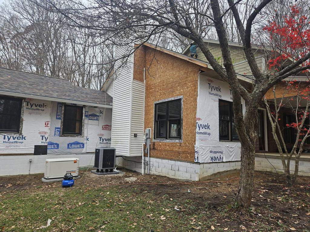 Siding Installation using Primed James Hardie & Straight Edge Shakes by Koontz Construction