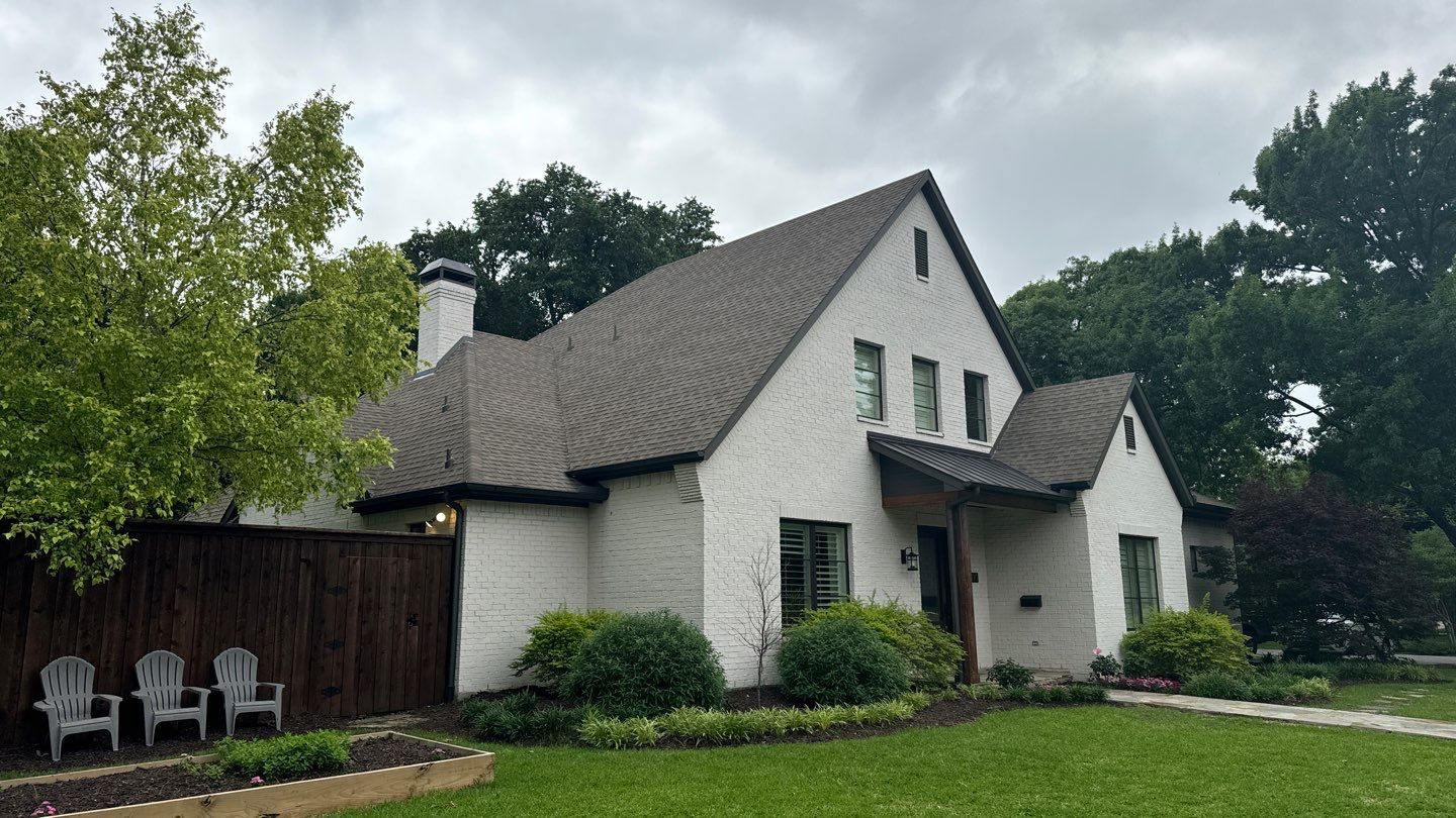 White brick with GAF Weathered Wood by Tejas Roofworks + Restoration