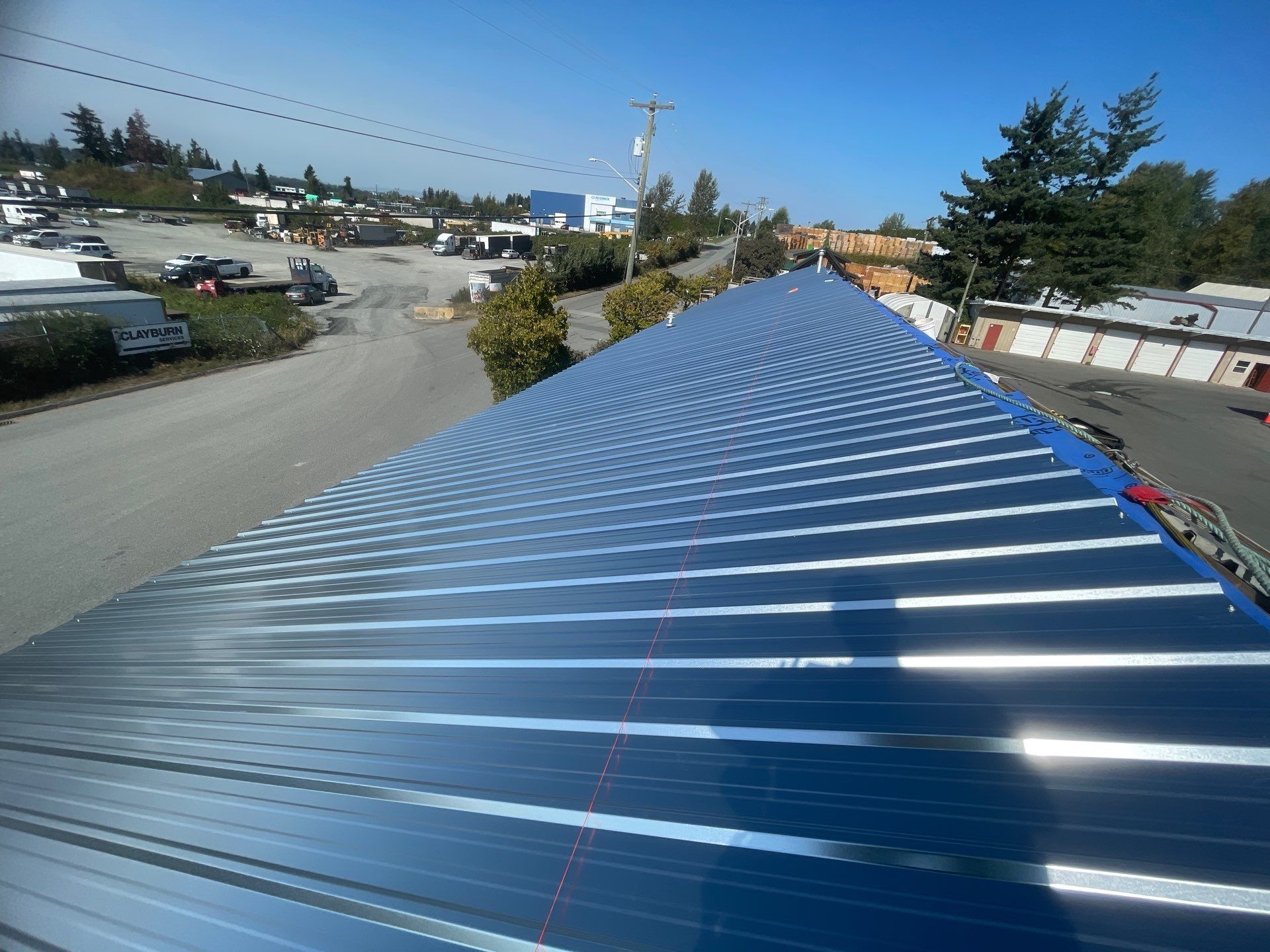 Commercial Re-Roof using Galvanized Duroclad by Top Notch Roofing Inc