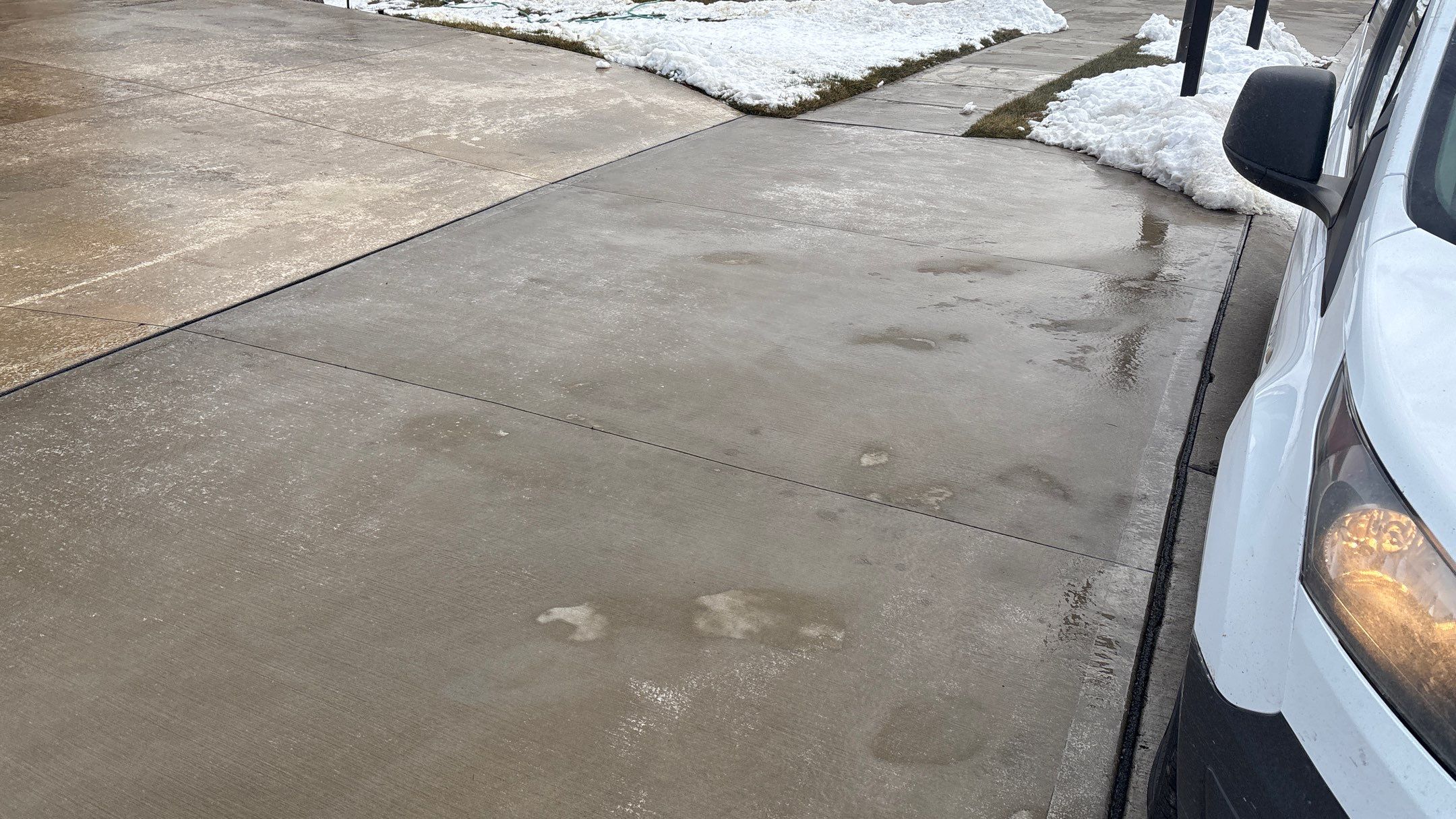 Two-Tone Driveway Resurface - Olathe, KS by Big Red Decorative Concrete, LLC