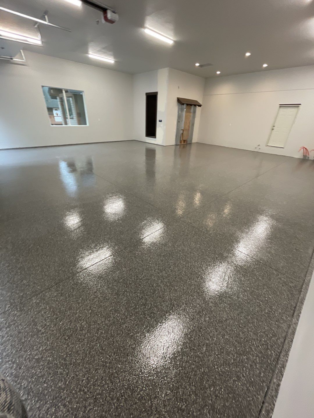 Garage Transformation using Silver Creek and the Penntek Evolution Flooring System by Croc Coatings, LLC