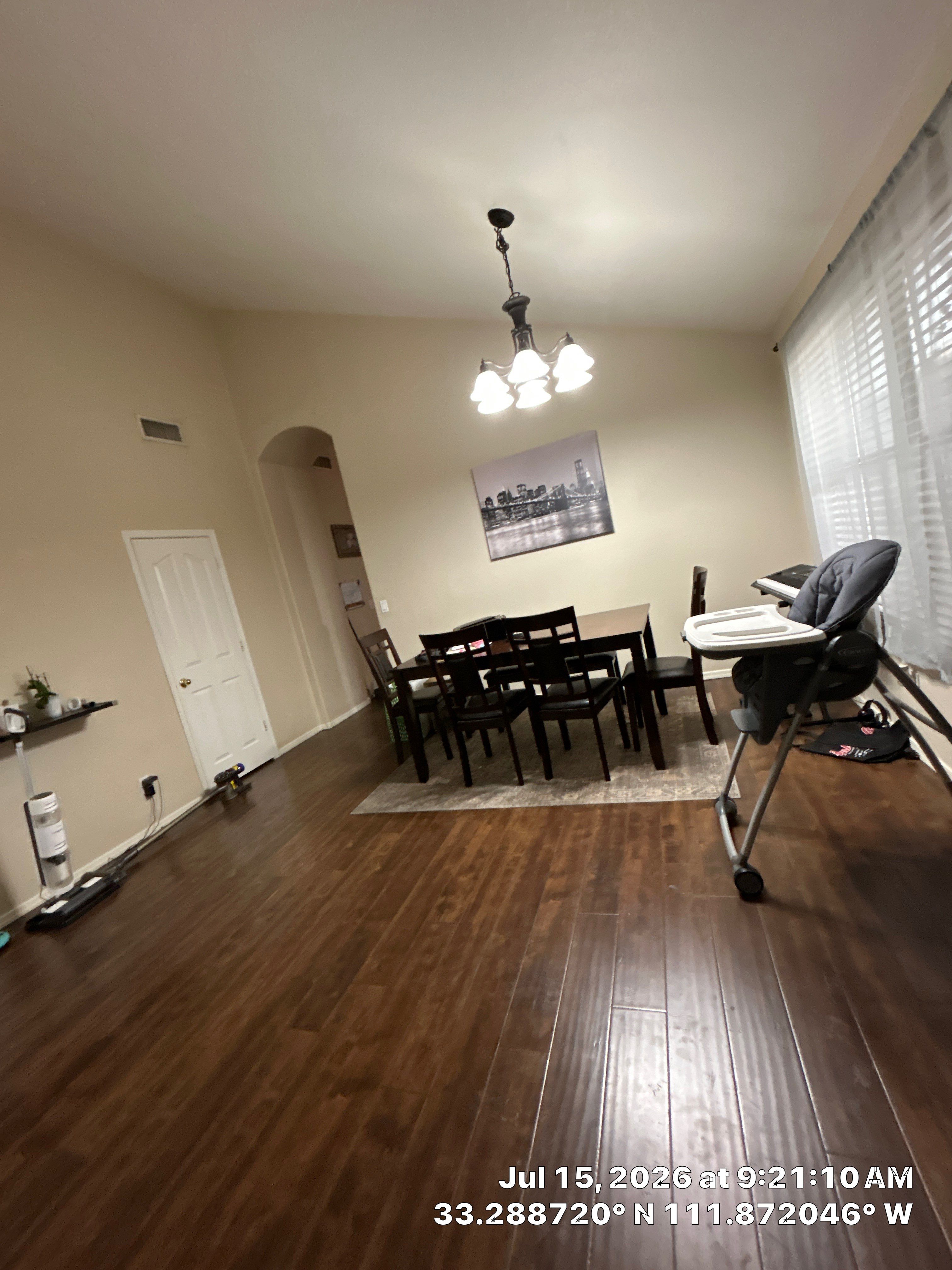 Dark Wood Laminate Flooring Installation for Chandler Dining Room by CompanyCam Sales Demo