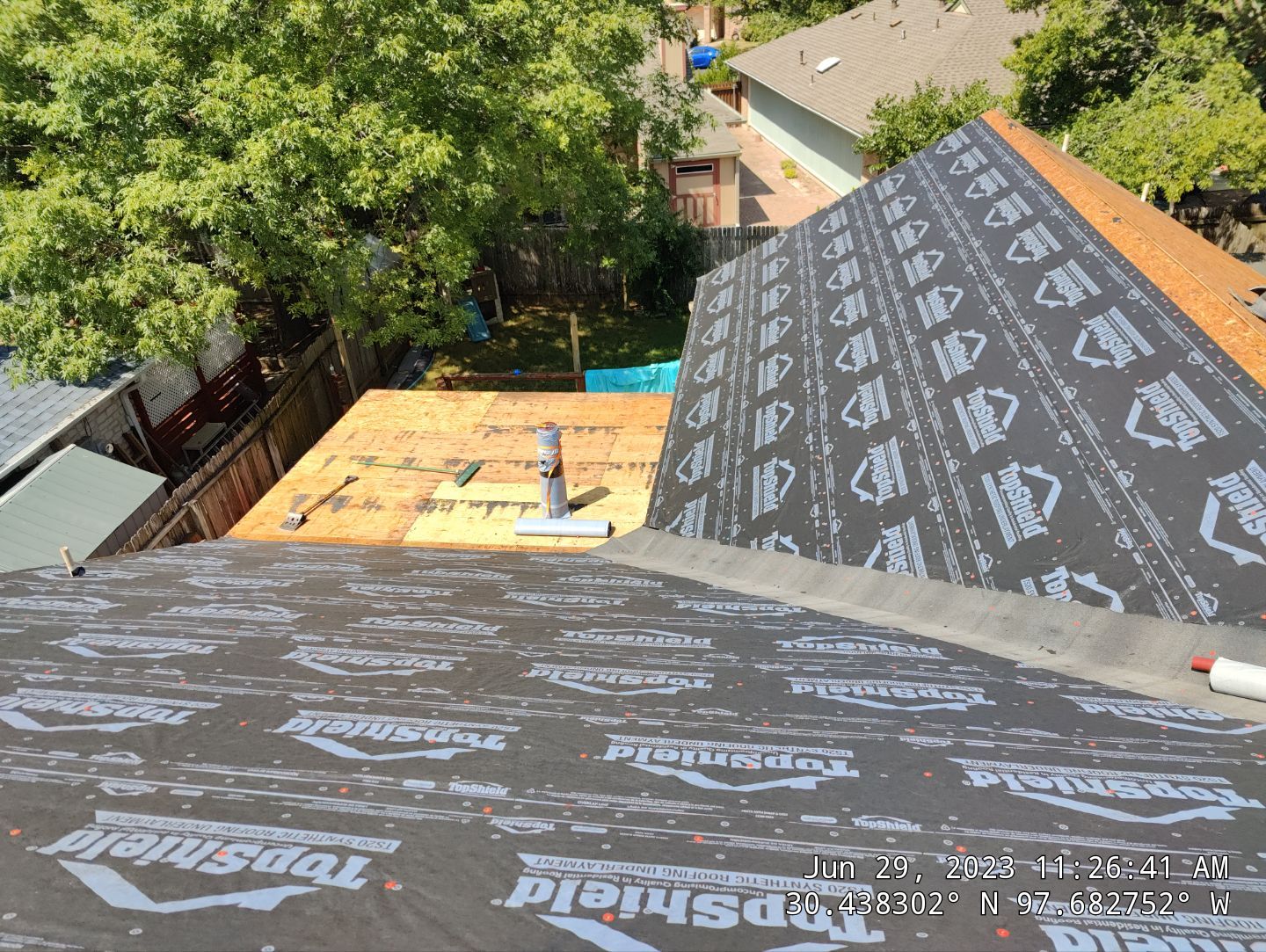 New Roof Installation Of IKO Dynasty Color Brownstone by DeZign Roofing & Exteriors