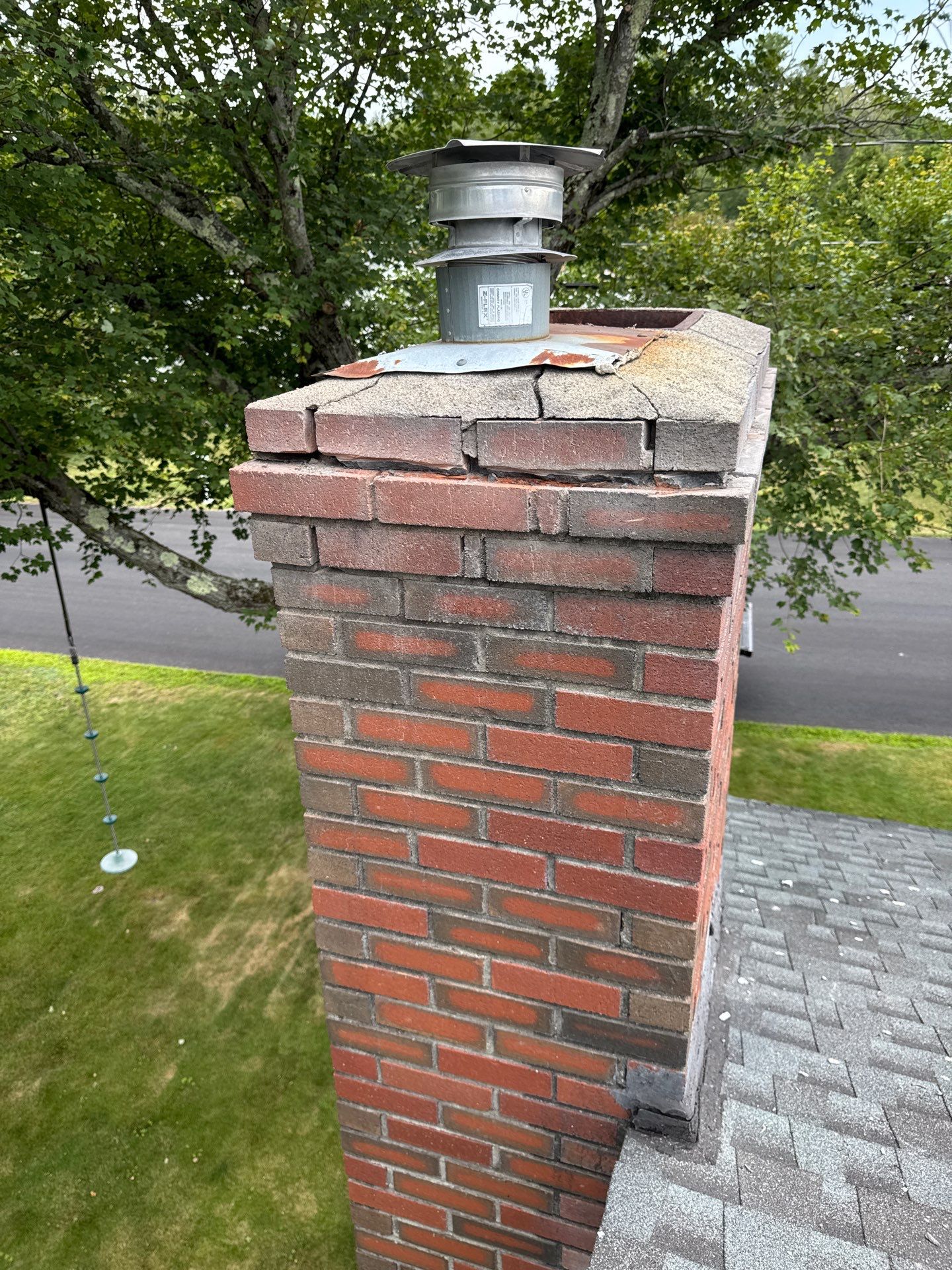 Lowell Premium Velux Curb-Mount Skylight & Chimney Restoration by Mighty Dog Roofing of Greater Middlesex County