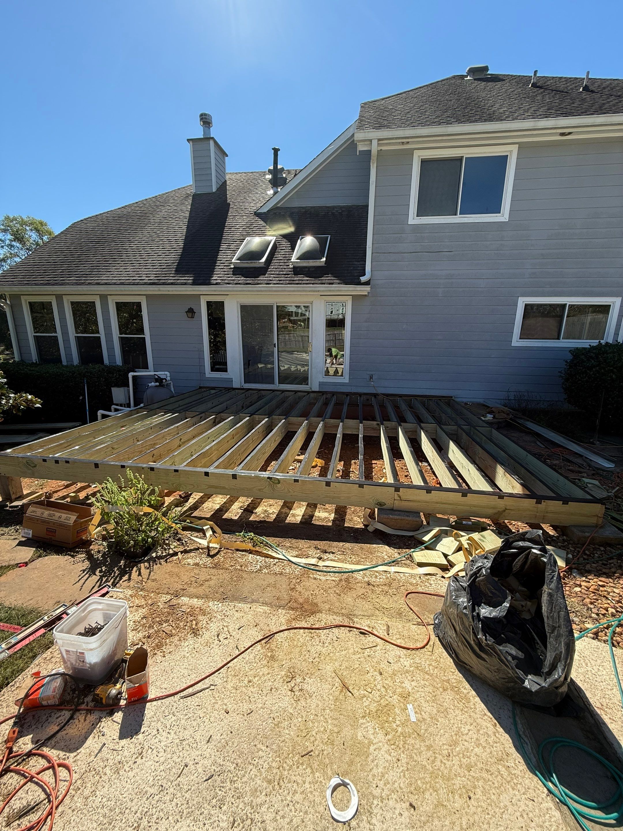 Custom Composite Deck with Integrated Seating in Roswell by Swift Home Renovations
