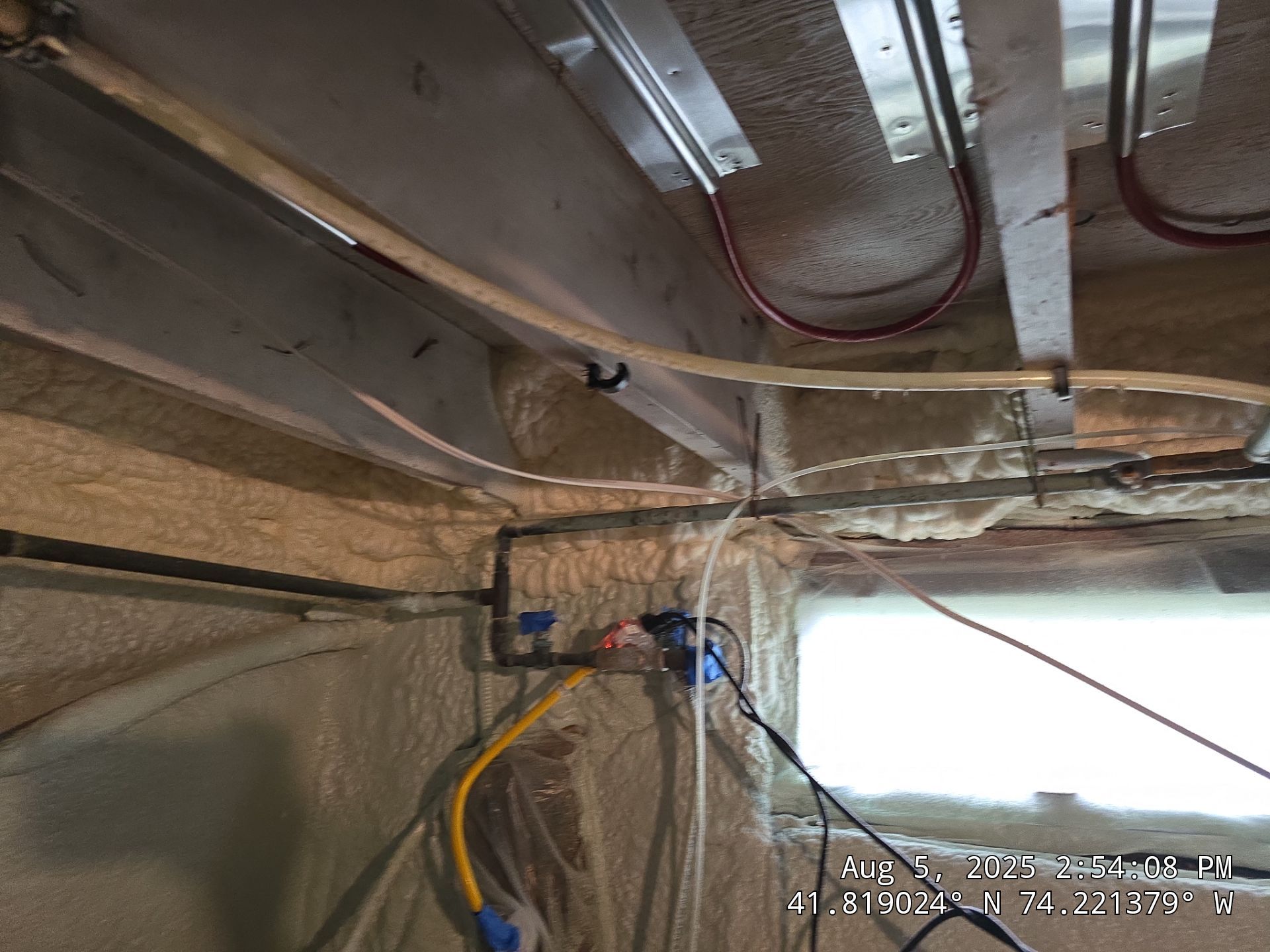 Master bedroom Exterior Walls using open cell spray foam by NYS Foam & Energy