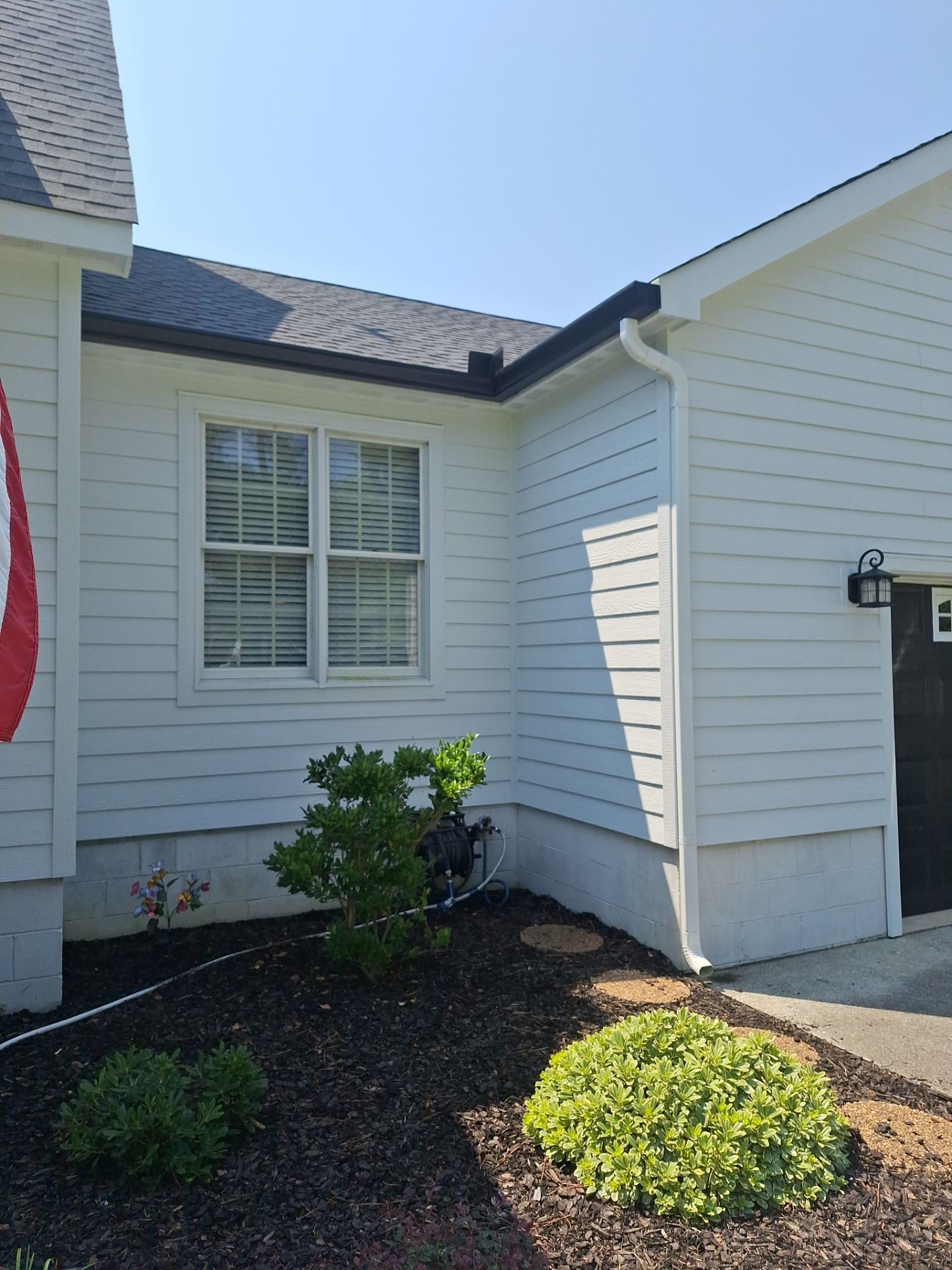 Black Gutter Installation by Gallop Roofing & Remodeling, Inc.