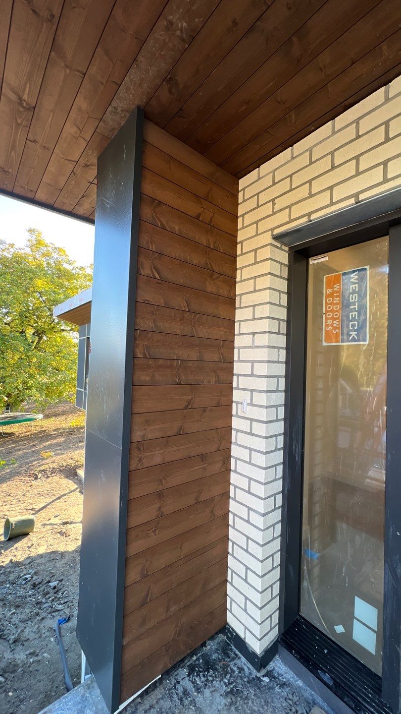 Residential Roofing Installation using multiple products by Top Notch Roofing Inc