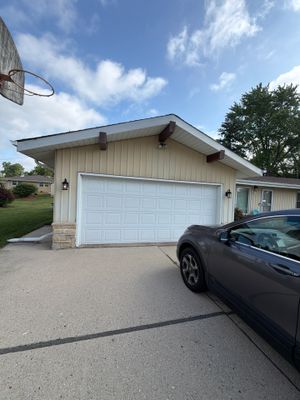 Milwaukee Residential Exterior Renovation with Siding and Concrete Upgrades