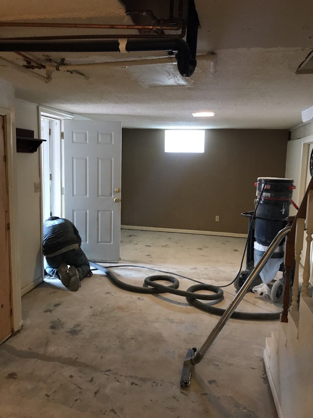 Basement using Driftwood by Select Painting, Coatings & Garage Cabinets