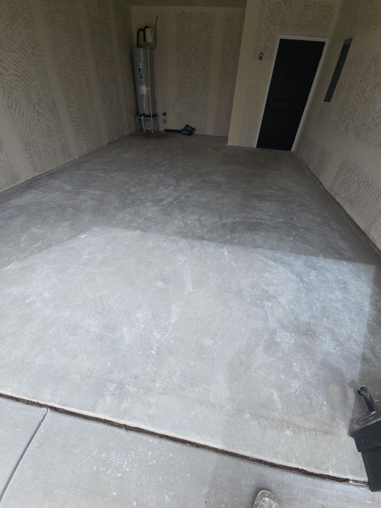 Domino 1/4-Inch Chip Garage Floor Coating in Coeur d'Alene by Croc Coatings, LLC