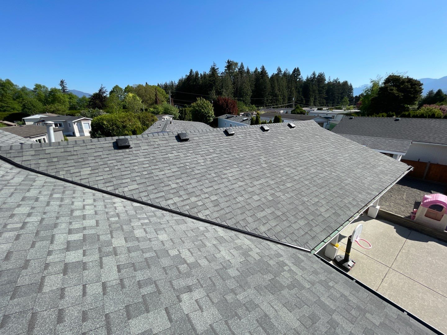 Residential Roofing Installation using Estate Gray Shingles by Top Notch Roofing Inc