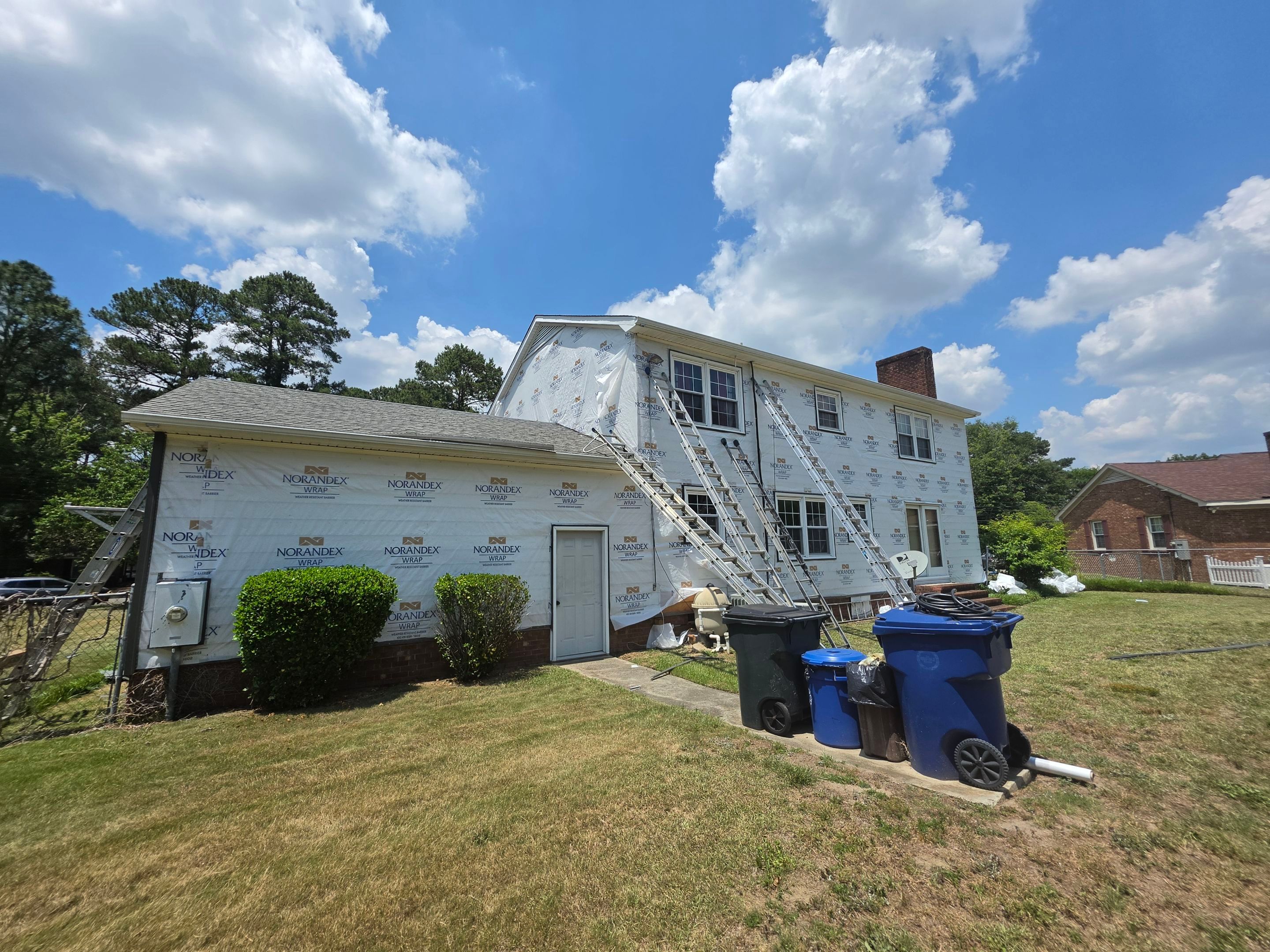 Dark Gray Siding and Custom Deck Installation in Kinston by The Remodeling Company