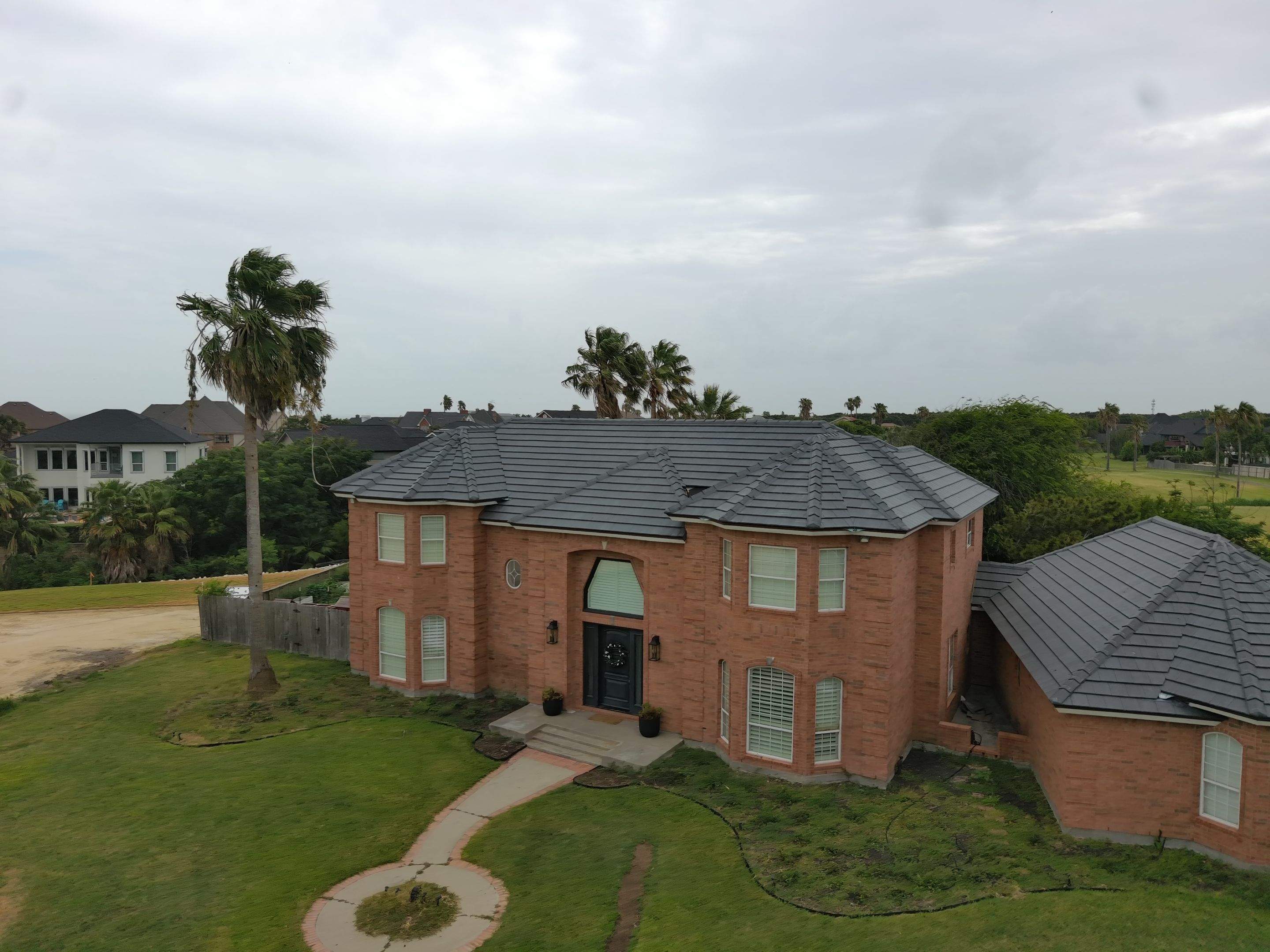Golf-Proof Tile Roof by Bayfront Roofing and Construction