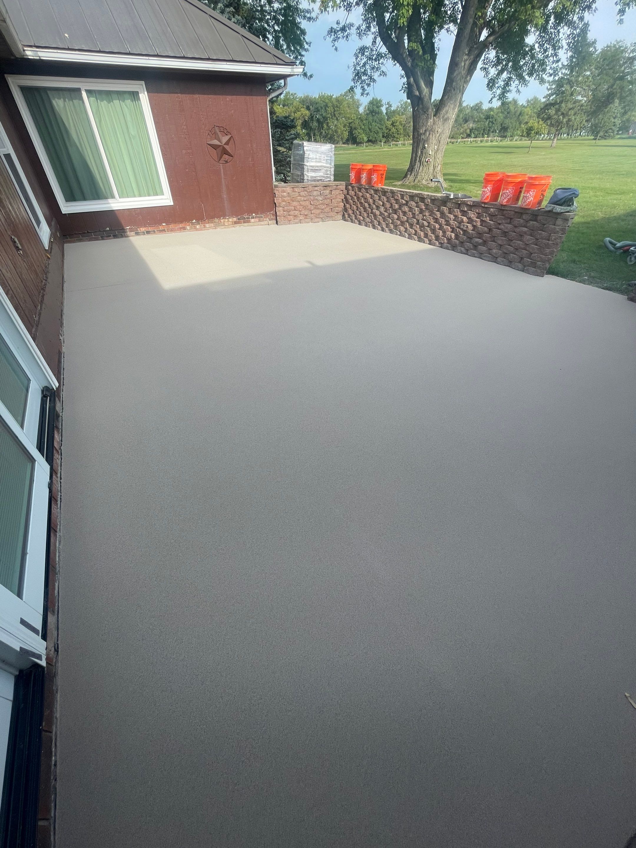 Concrete Patio Resurfacing and Protective Coating in Winfred, South Dakota by Select Painting, Coatings & Garage Cabinets