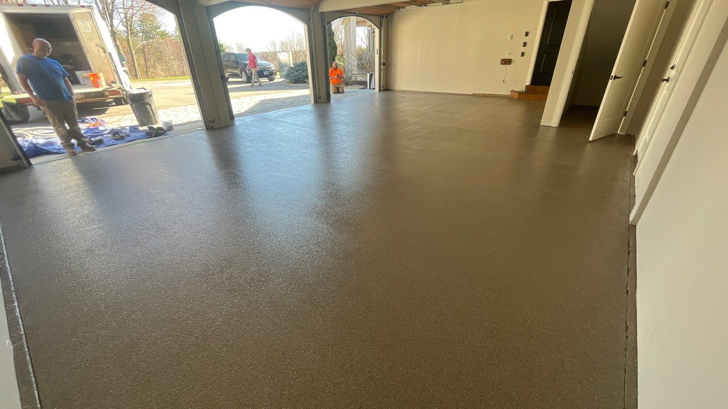 Garage in Bedford, NH 03110 by Symphony Concrete Coatings
