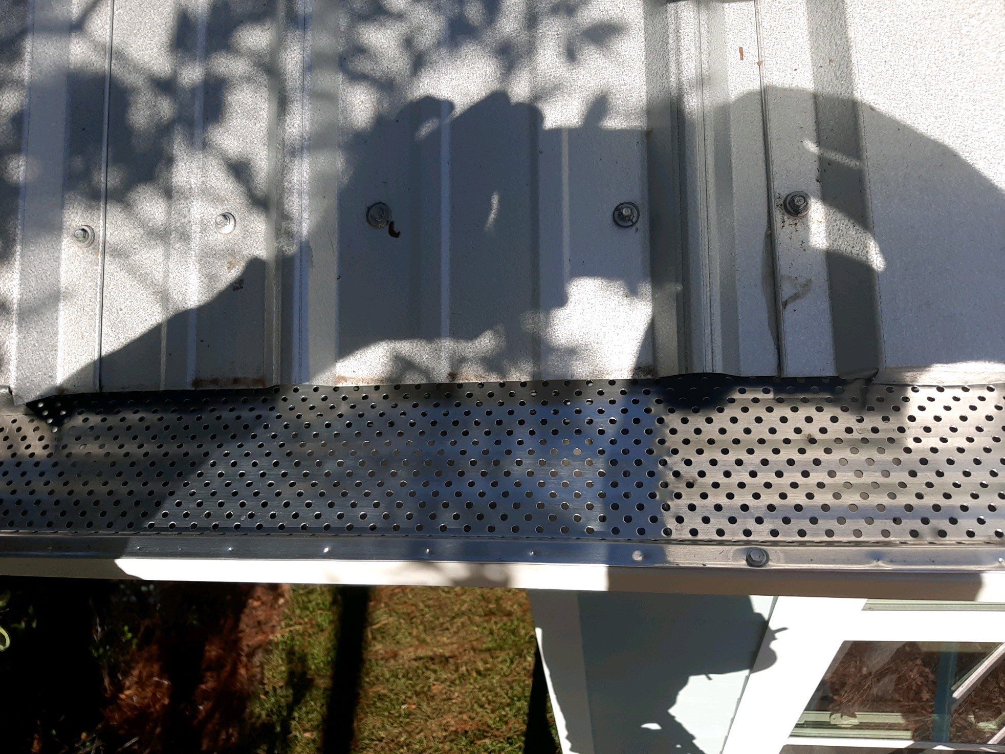 Gutter Installation using K-Style Seamless Gutters and Gutter Guards by Gutter Professors