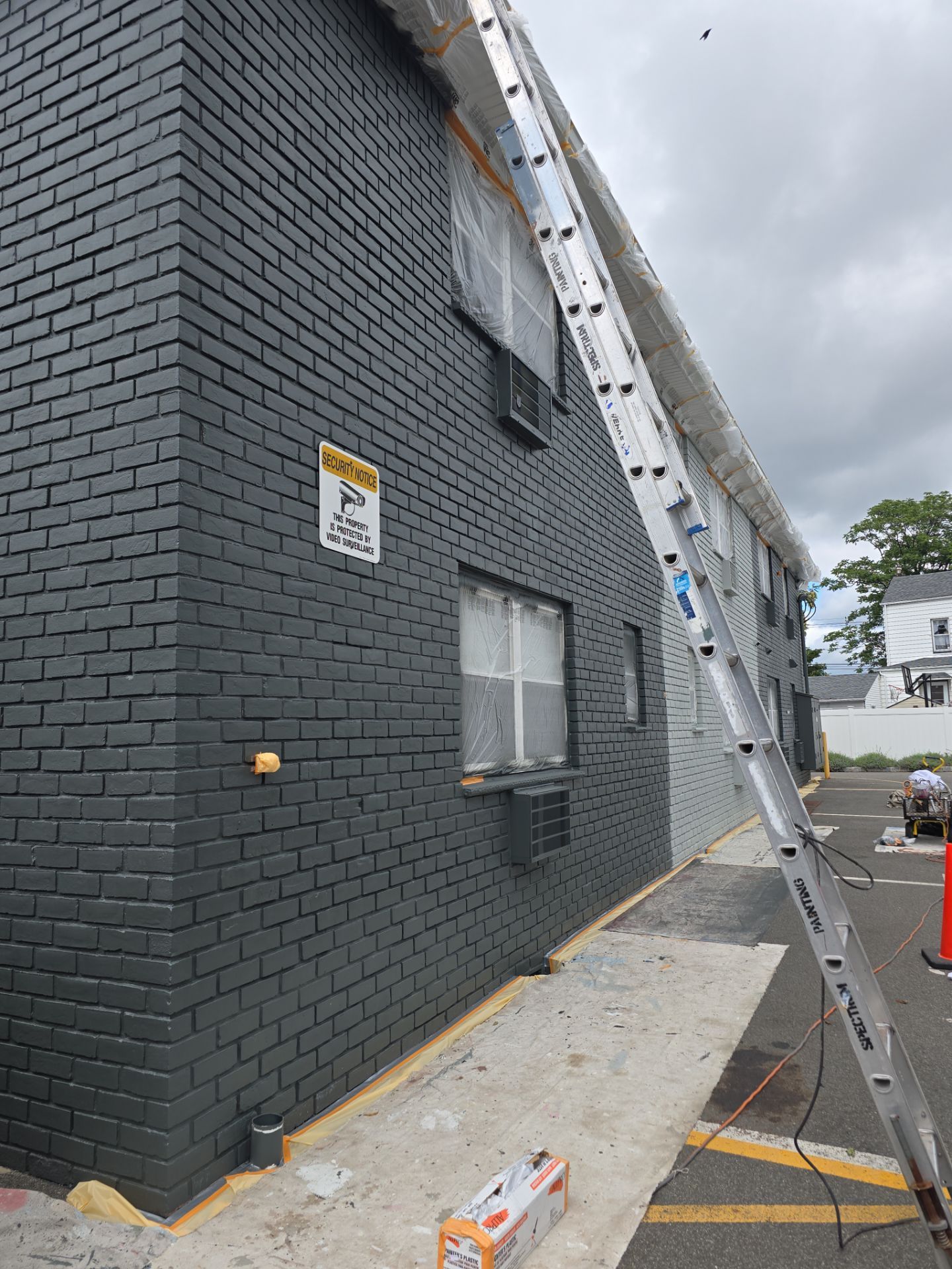 Multi-Unit Apartment Complex Exterior Brick Painting Project in Hackensack by Spectrum Painting, LLC