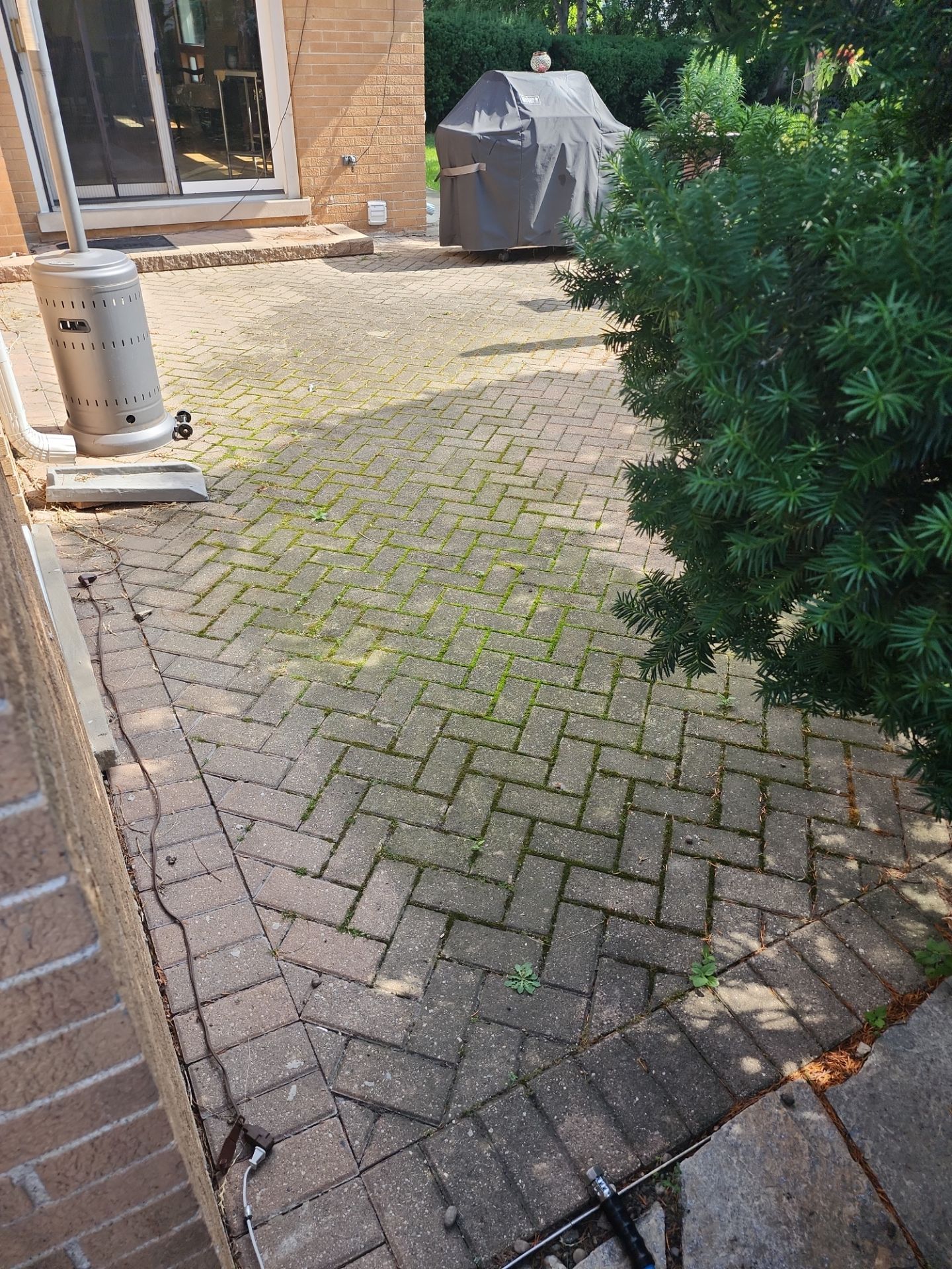 Brick paver cleaning  by Northern Power Washing LLC.