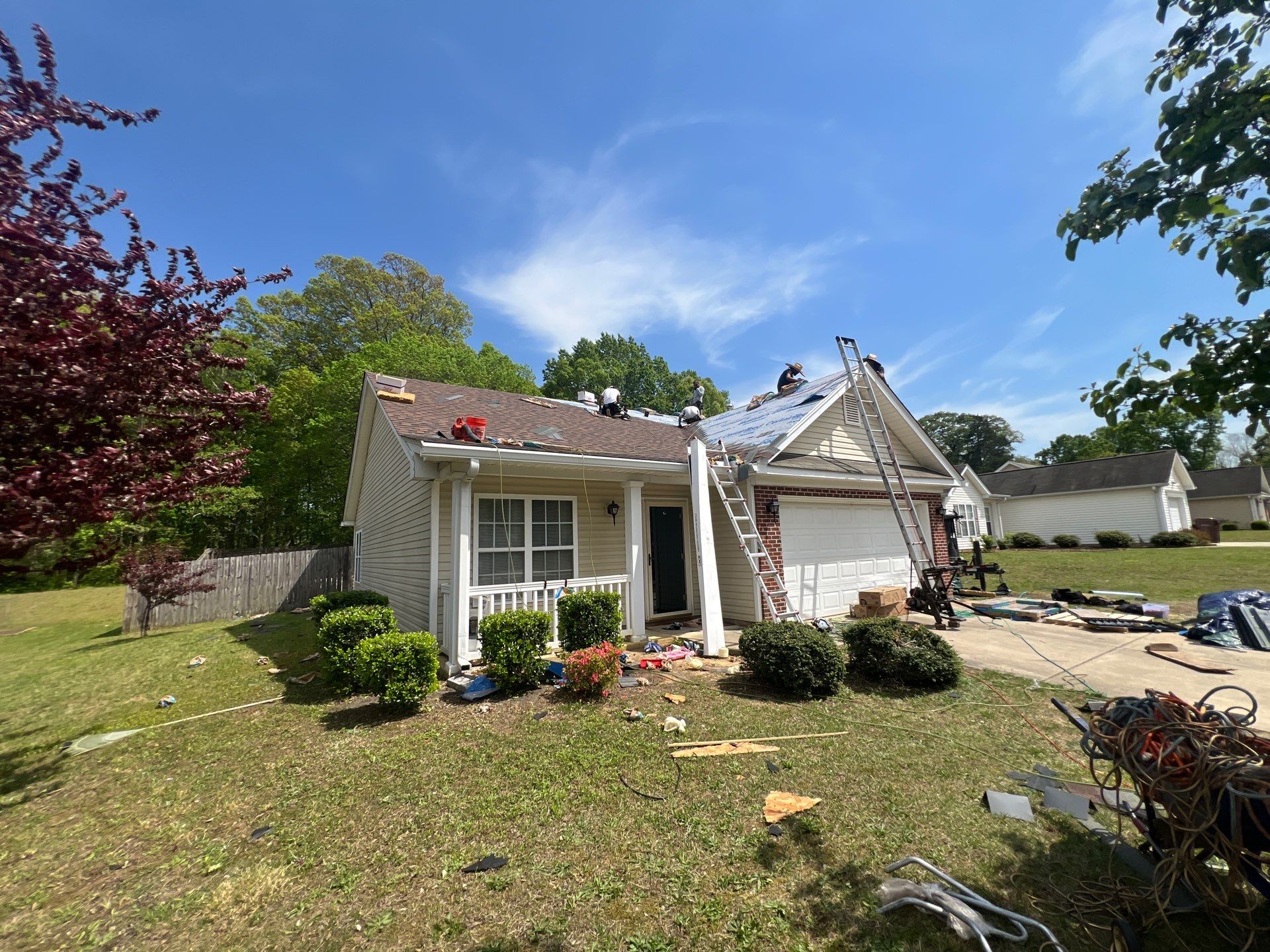 Burlington Residential Roof Replacement with Brown Architectural Shingles by The Remodeling Company