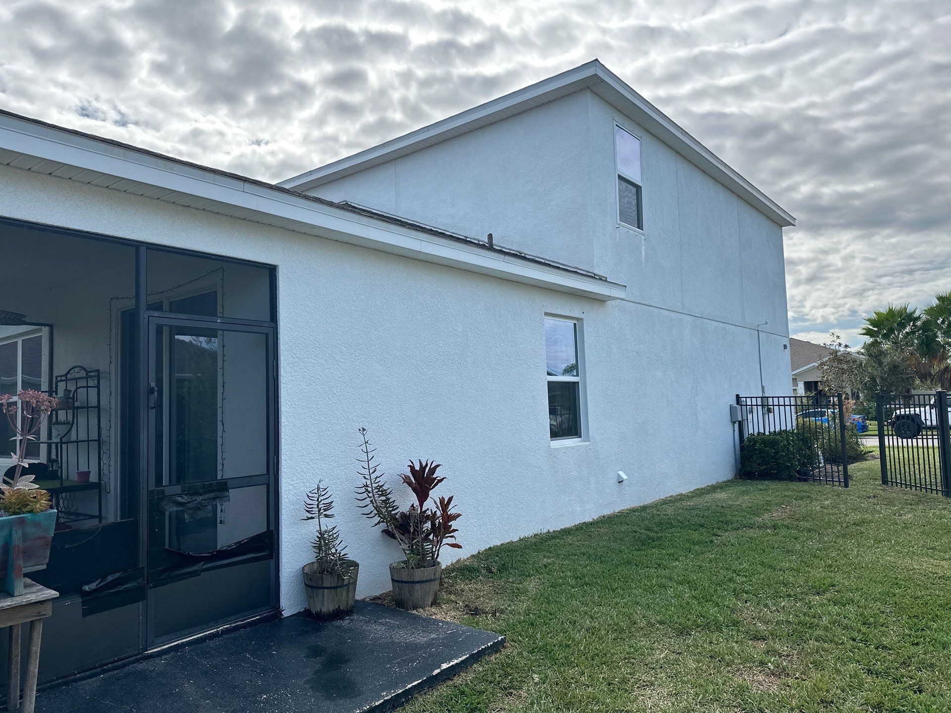 2-Story House Wash & Paver Driveway Cleaning in Trevesta Community, Palmetto, FL | Sunshine AquaWash by Sunshine AquaWash