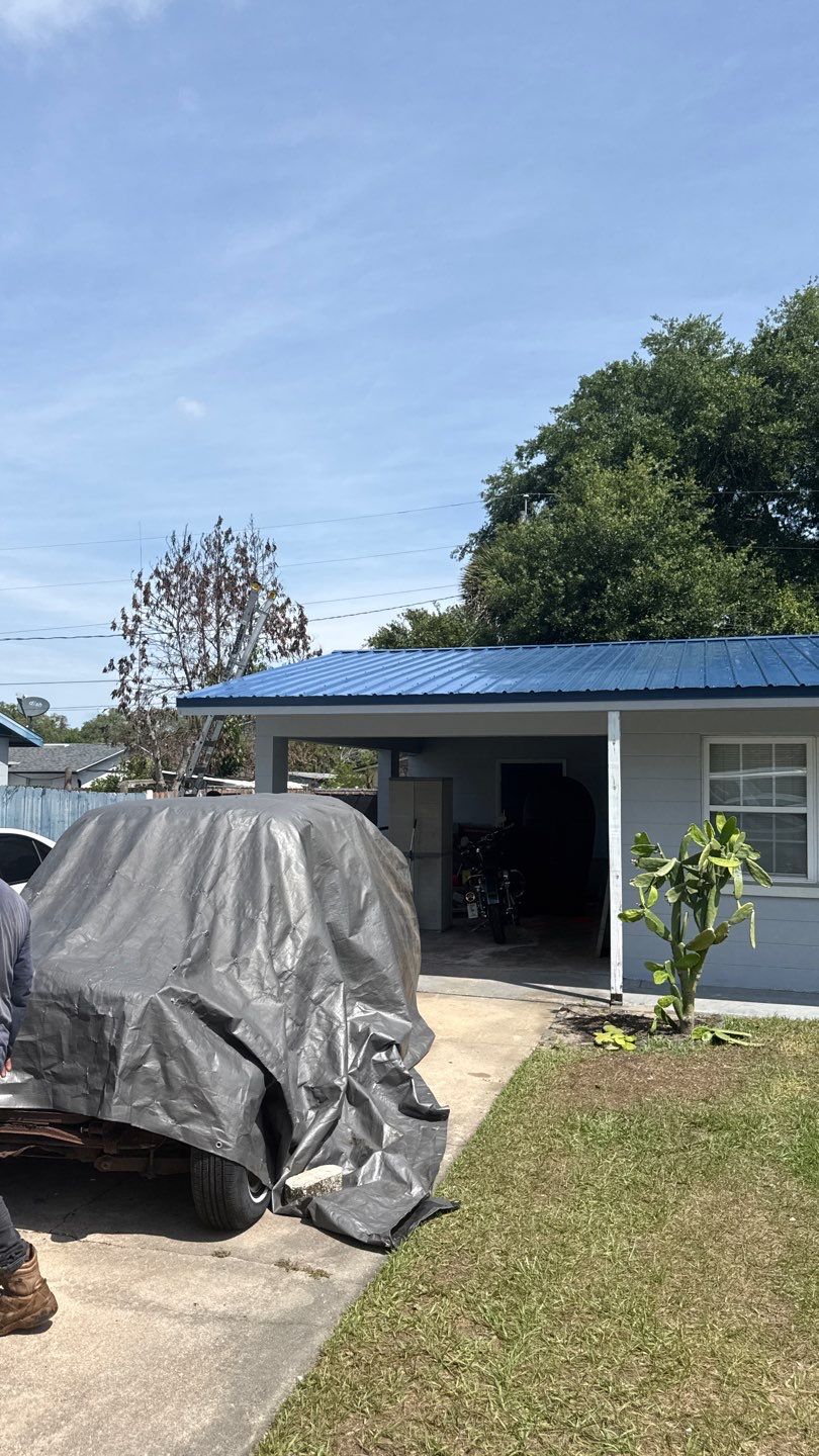 Blue Metal ReRoof and Decking Replacement in Casselberry by Tip Top Roofing Co., Inc.