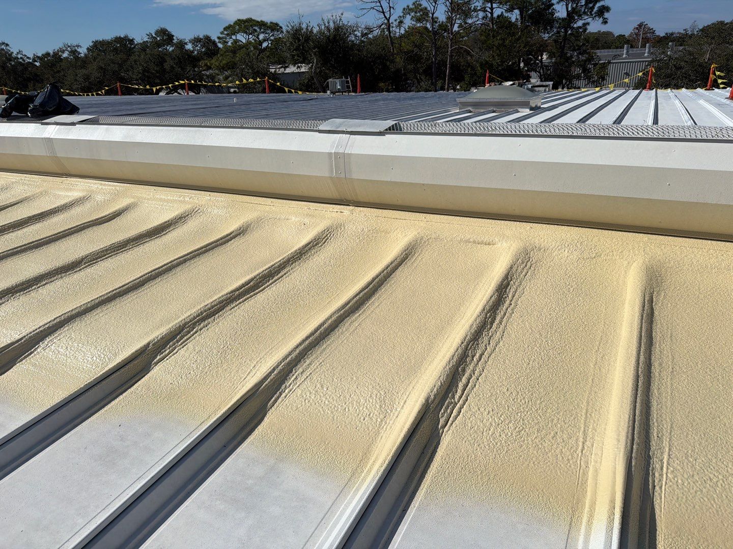 Sarasota Industrial Warehouse Metal Roof Silicone Coating Restoration by CES Roofing