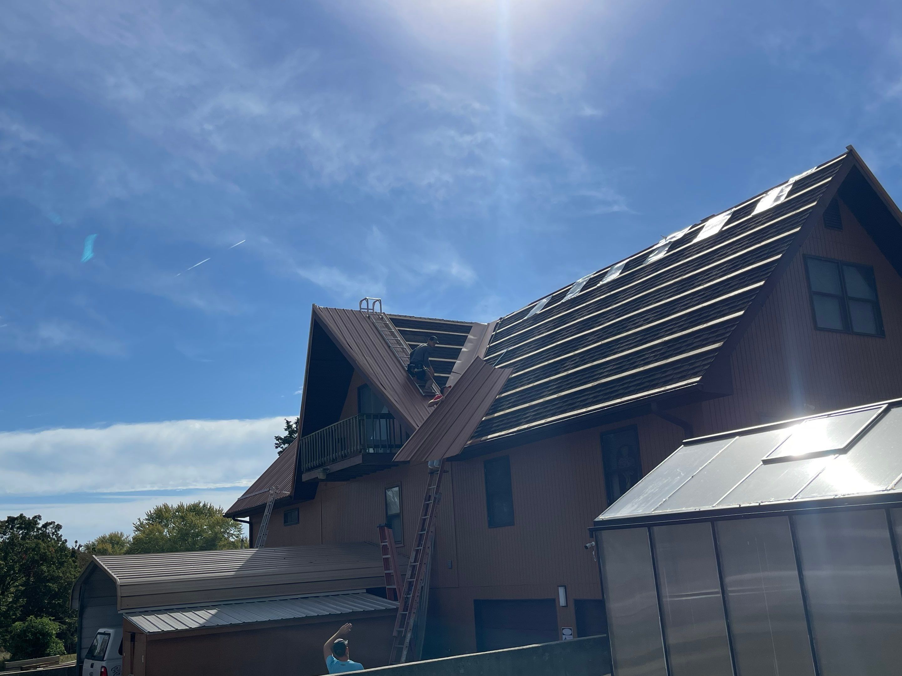 Residential Roofing & Snowguard Install - 29 Gauge G-Rib Metal - Color Copper Metallic  by Titan Commercial & Residential Roofing 