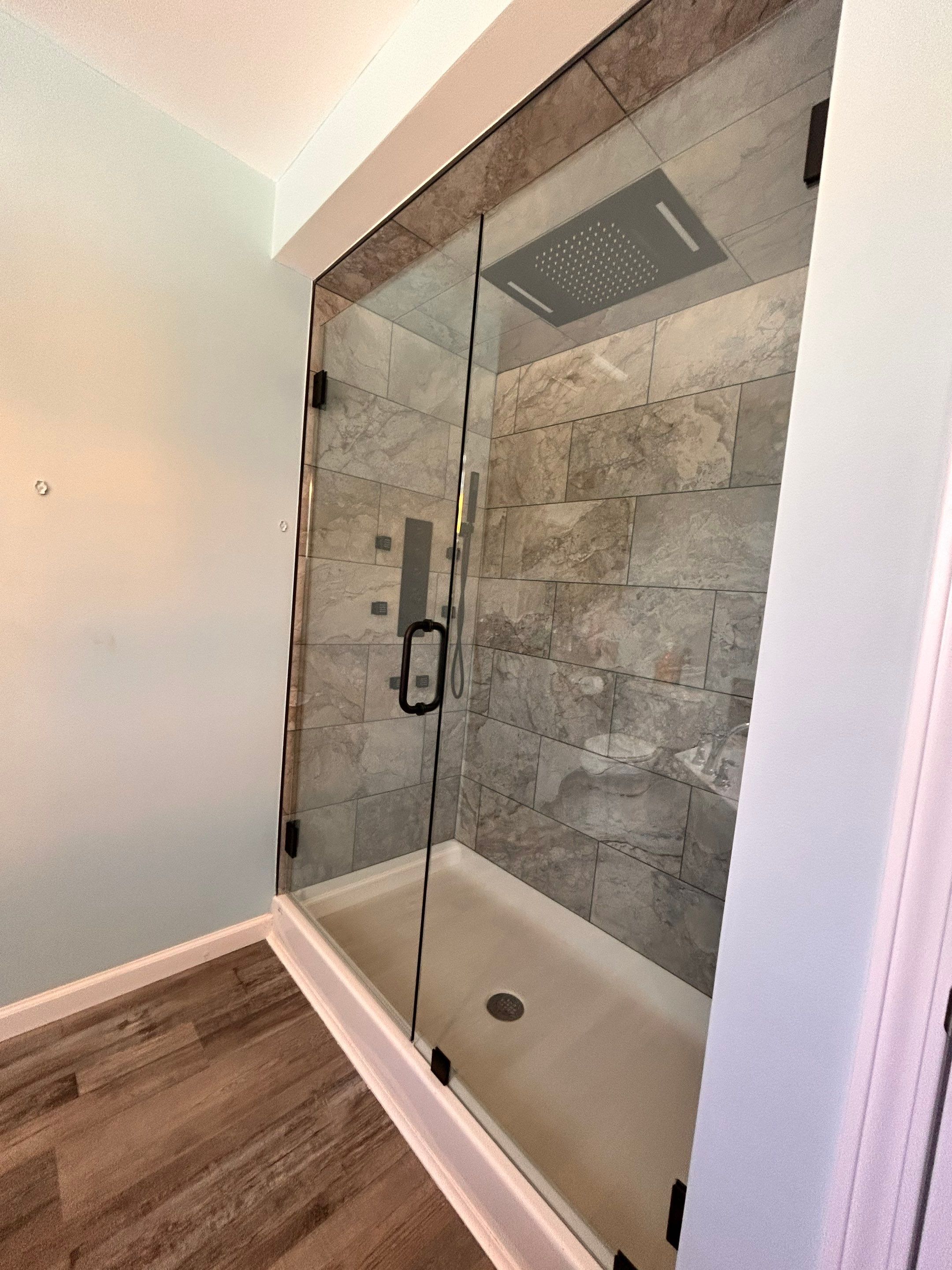 Bathroom Remodel using Tempered Shower Glass by Cheshire Glass Company