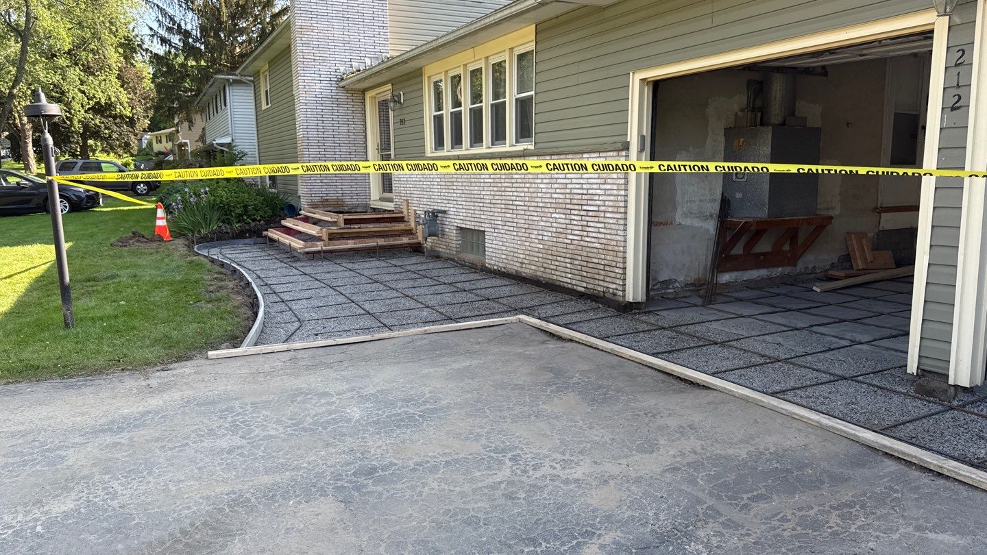 Concrete garage floor replacement  by NG Masonry & Construction LLC