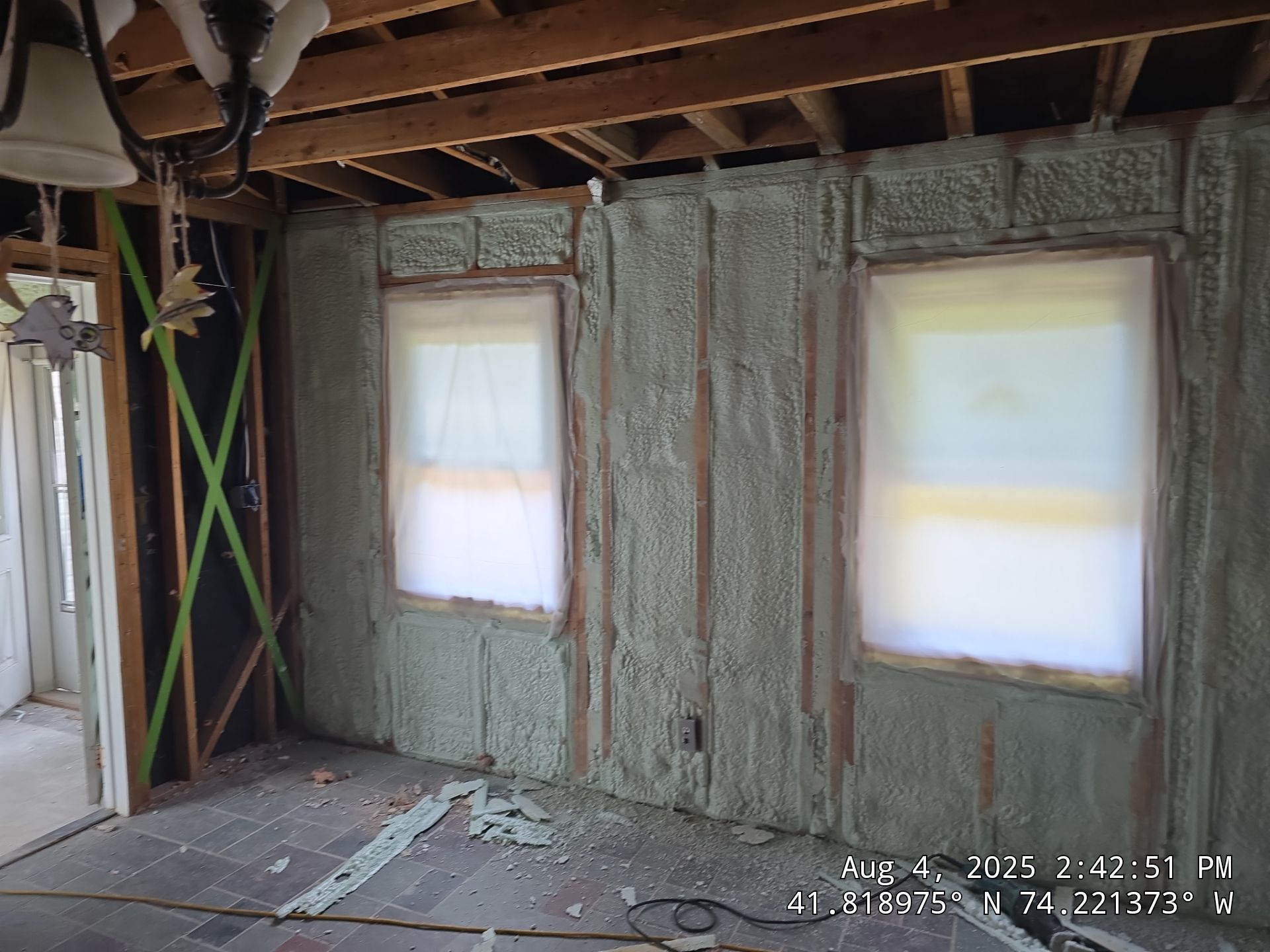 Master bedroom Exterior Walls using open cell spray foam by NYS Foam & Energy