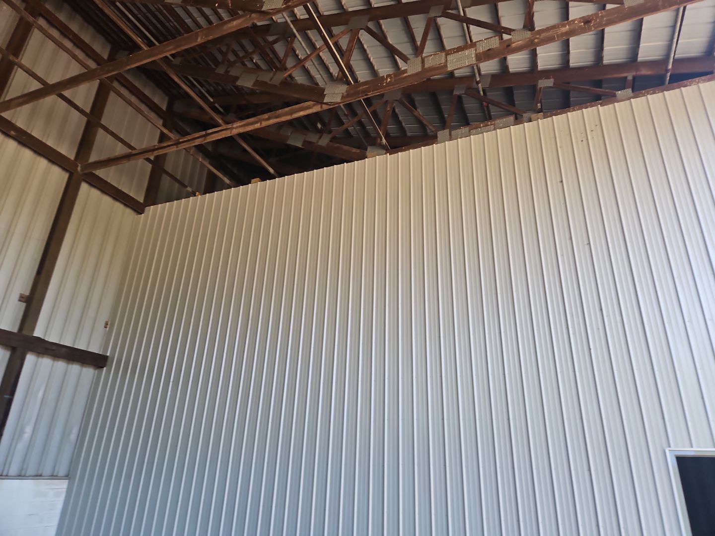 Steel Siding Install on Lean-To by 42 North Construction, LLC.