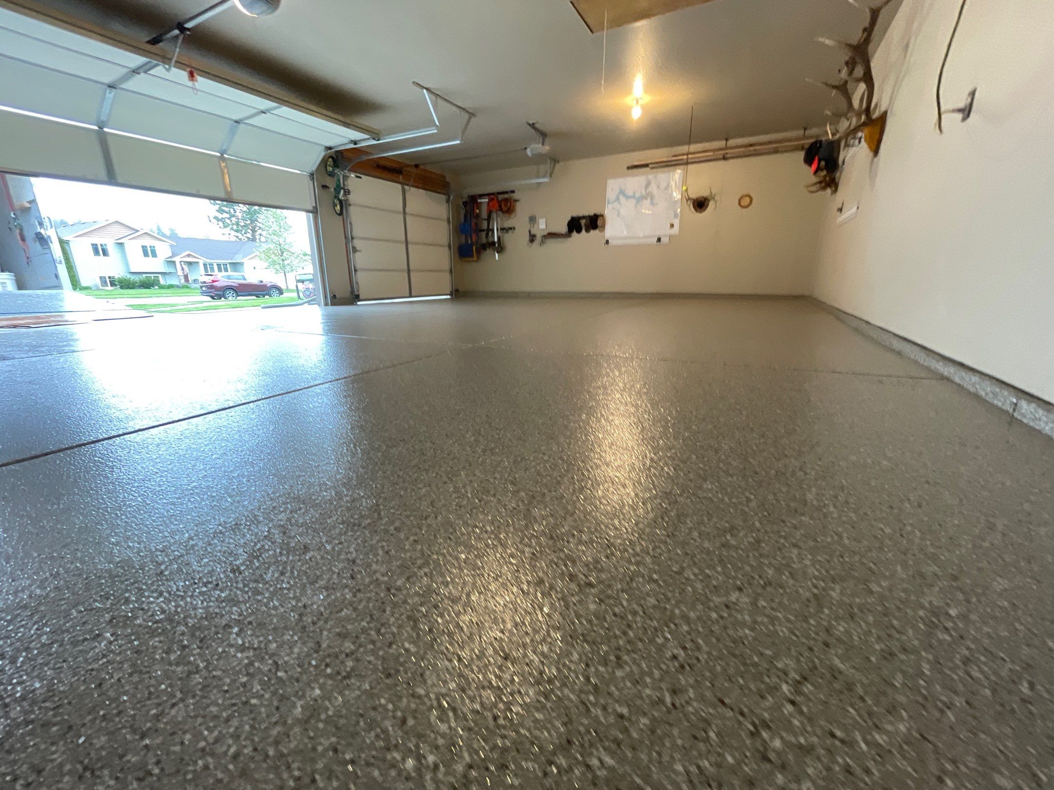 Garage Transformation using Pebble Beach and Front Porch using Greystone by Croc Coatings, LLC