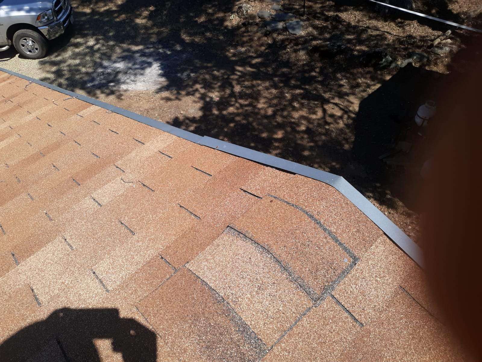 Metal roofing installation using Standing seam metal roofing system by Straight Edge Roofing Inc