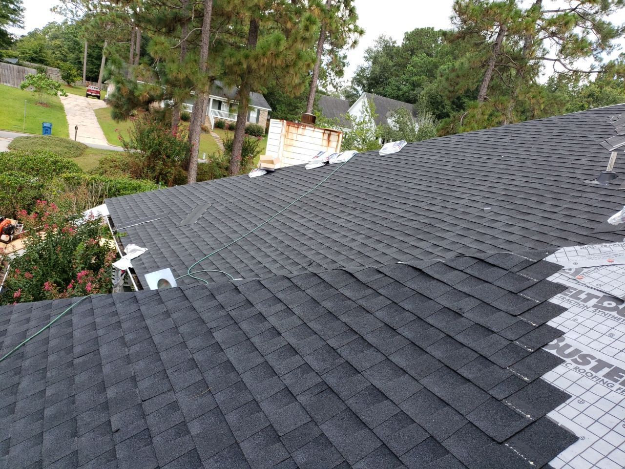 Residential Roofing Installation using Roof Replacement by American Roofing & Construction LLC