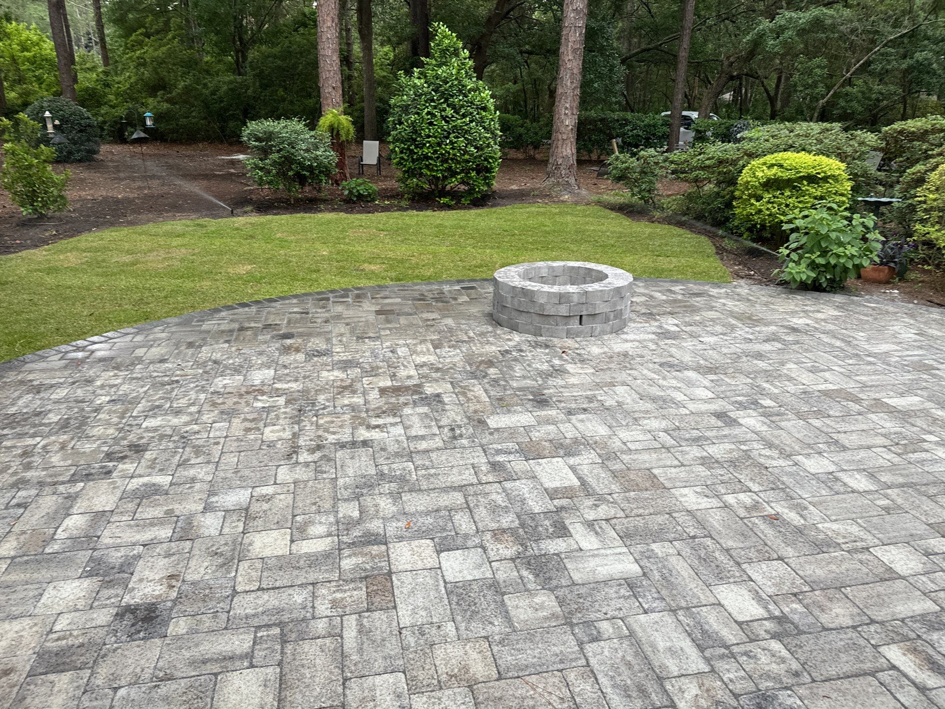 Custom Gray Paver Patio and Fire Pit Installation in Hilton Head Island by Lowcountry Scapes, LLC