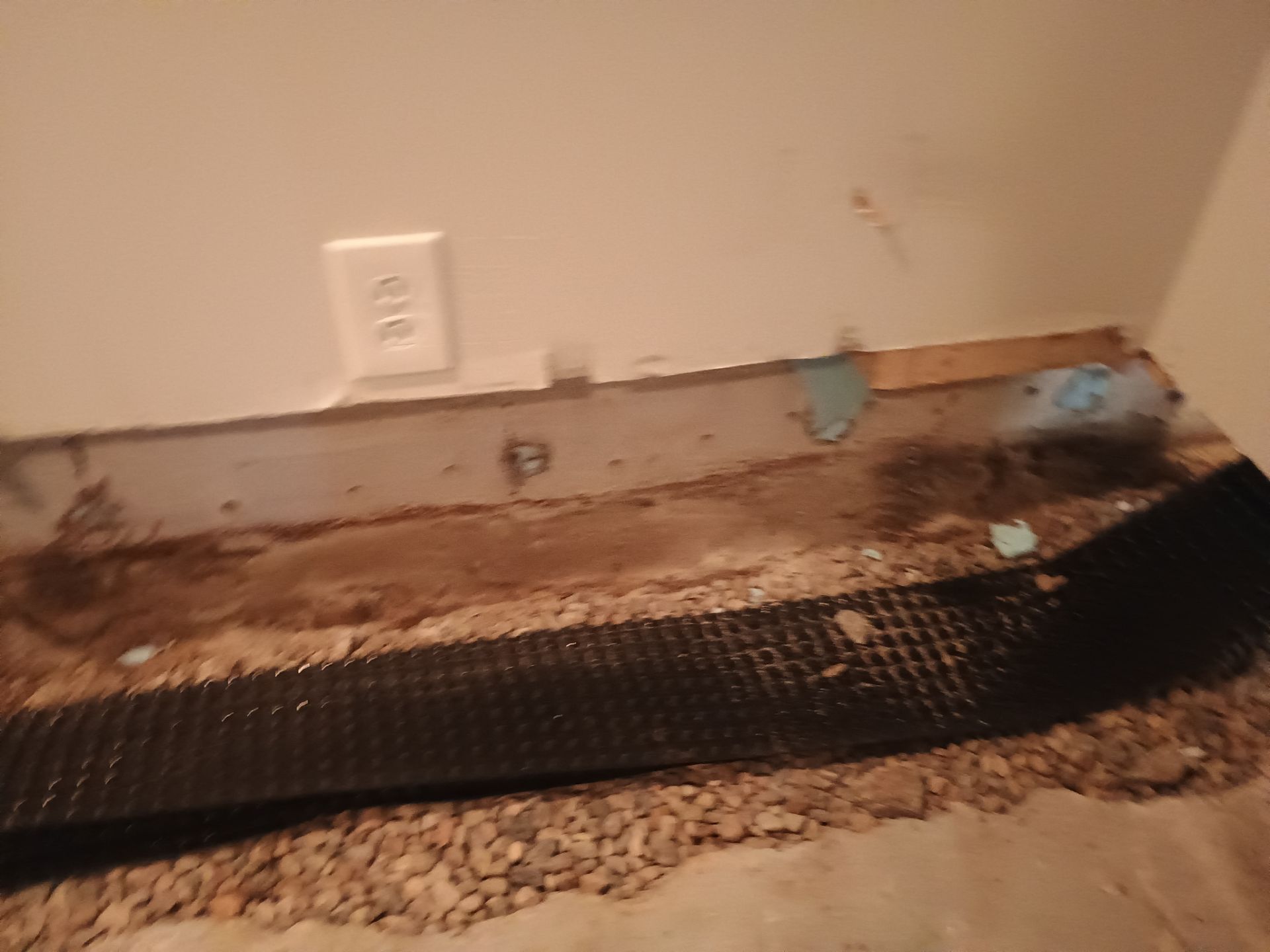 Interior Drain Tile in a Finished South Minneapolis Basement by Waterproofing Northeast