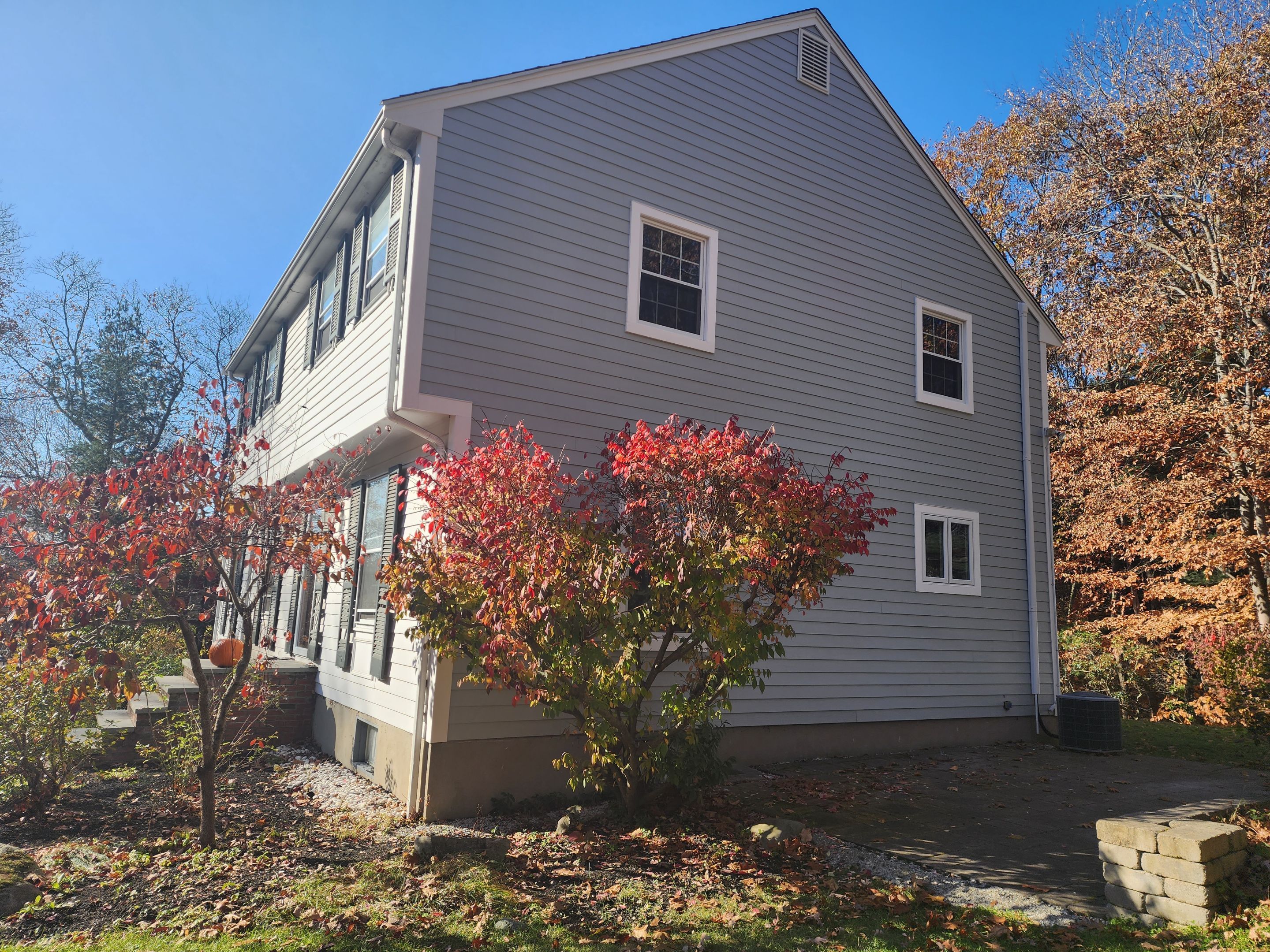 Custom window trim work and siding replacement in Dover, MA by UBrothers Construction