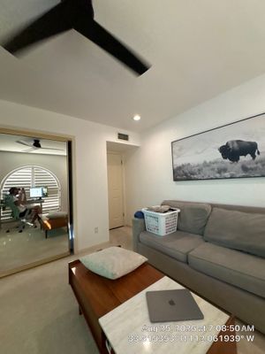 Modern Office Renovation With Arched Shutters and Mirrored Closets