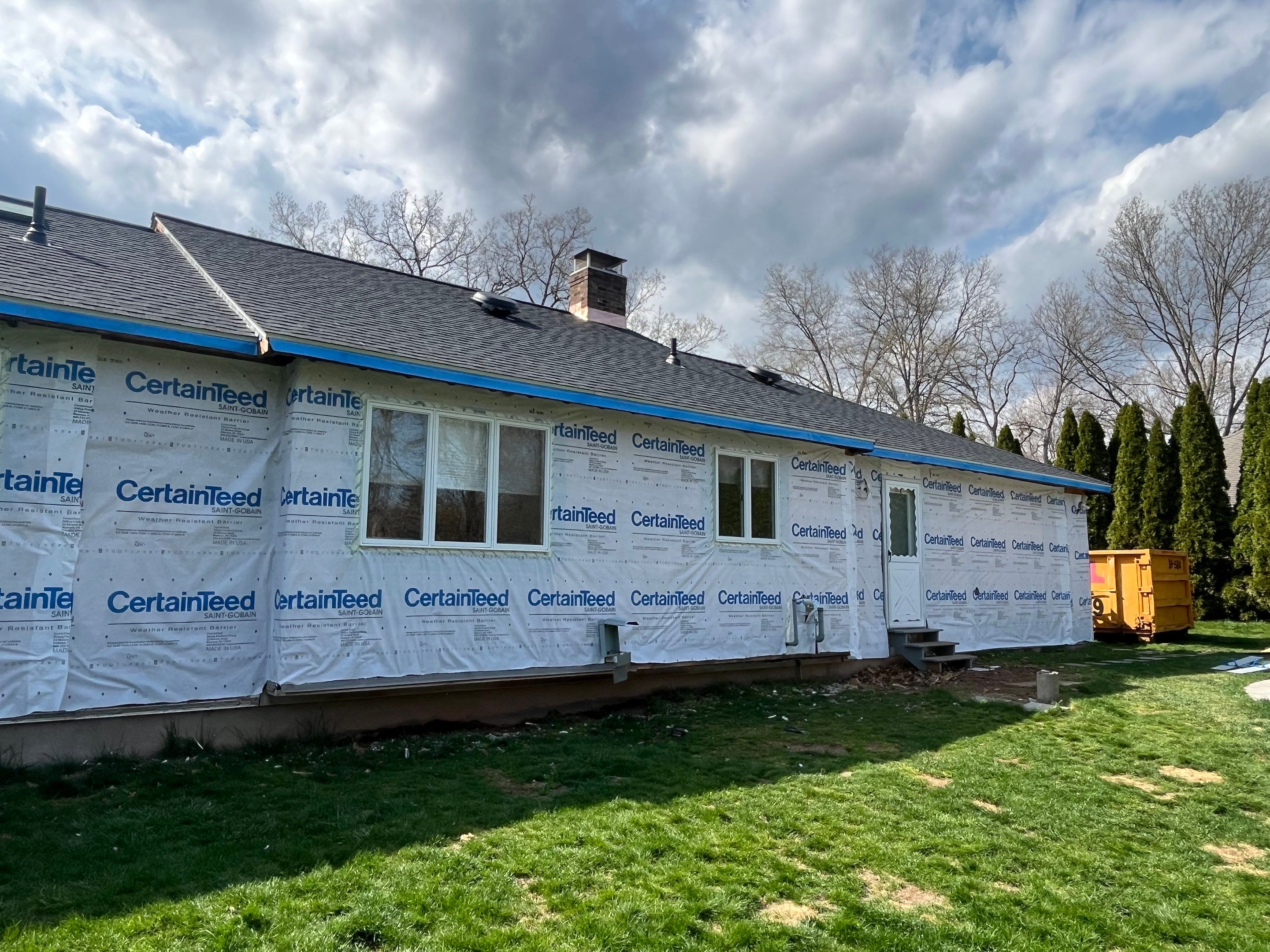 Refreshed Siding with Cert Monogram D/4 x 16'8" clapboard Charcoal Gray & Cert Monogram D/4 x 25' clapboard Charcoal Gray by DiGiorgi Roofing and Siding Inc