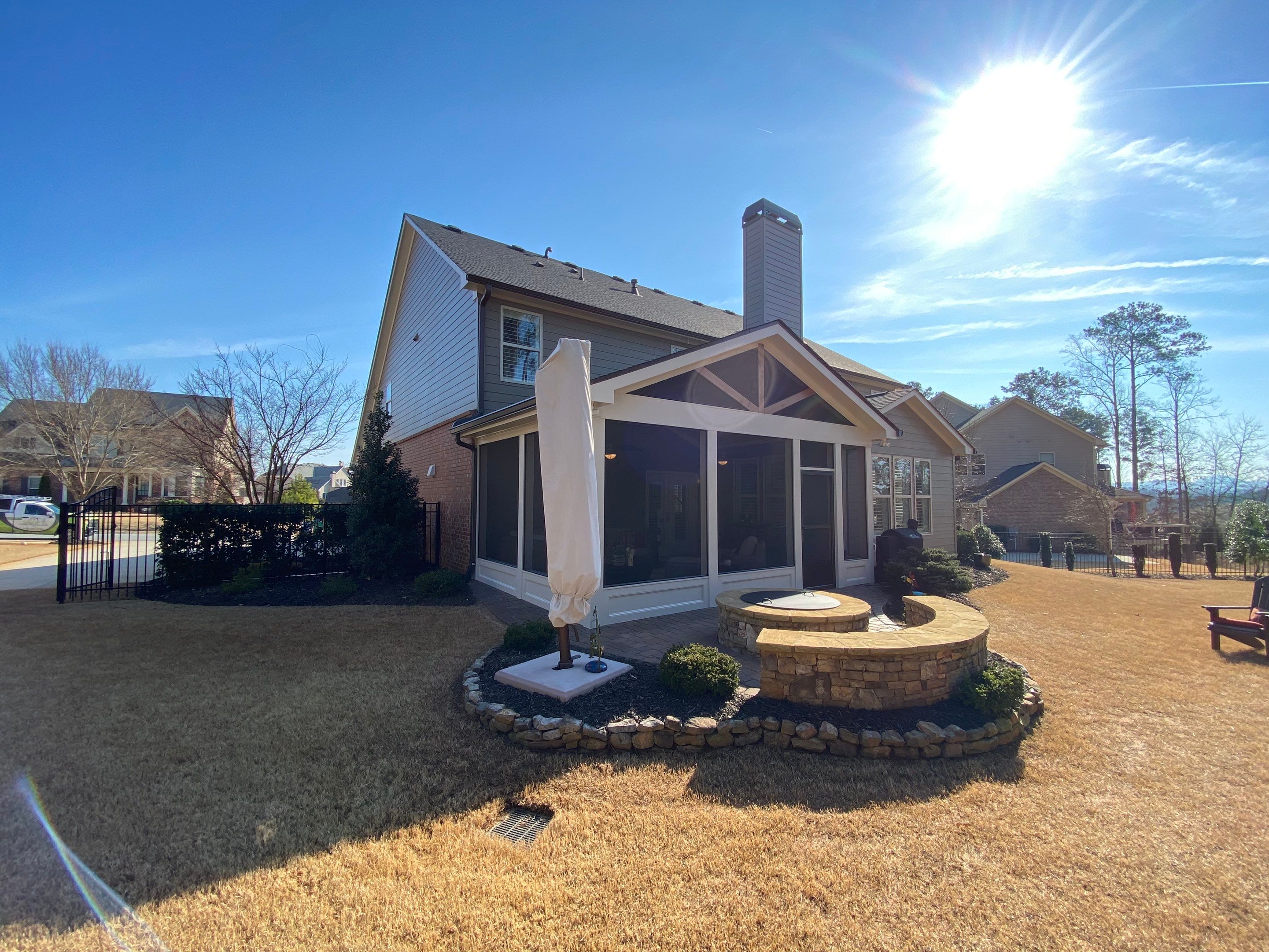 Custom Screened Porch Addition with Vaulted Wood Ceilings in Woodstock by Swift Home Renovations