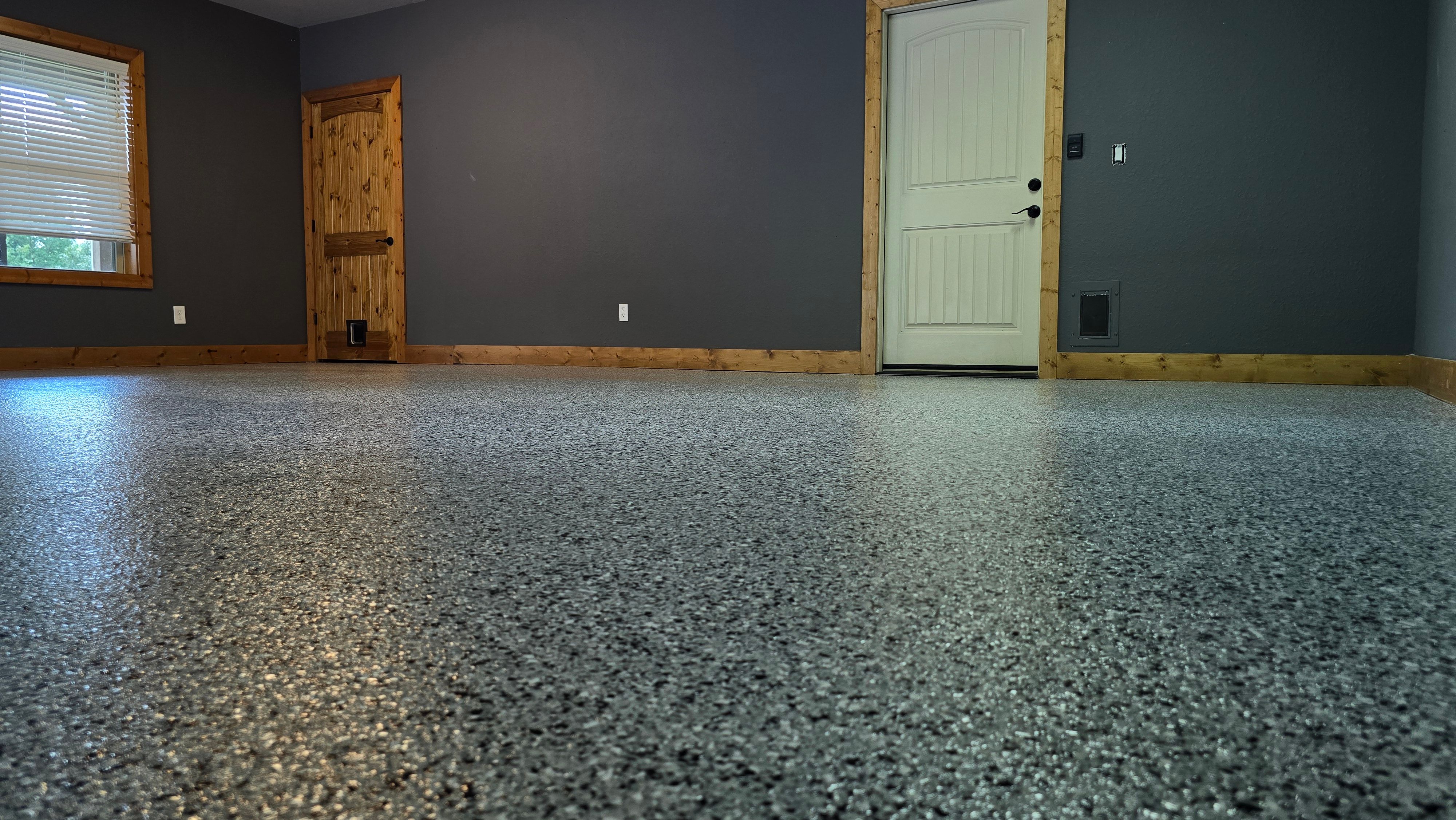 Garage using Houndstooth by Elite Floor Solutions